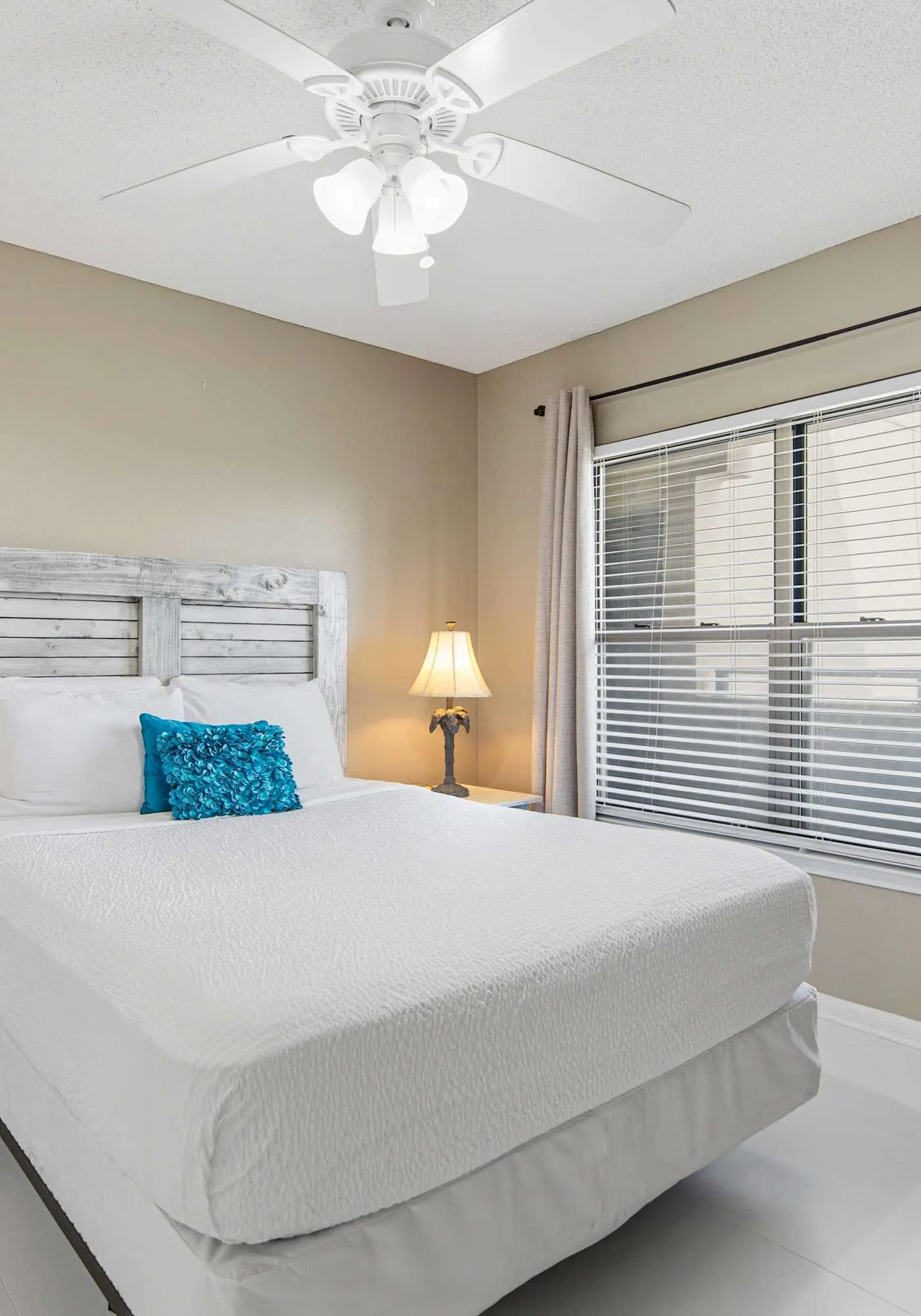 Spacious beachfront condo with full kitchen, shared pool and beach access
