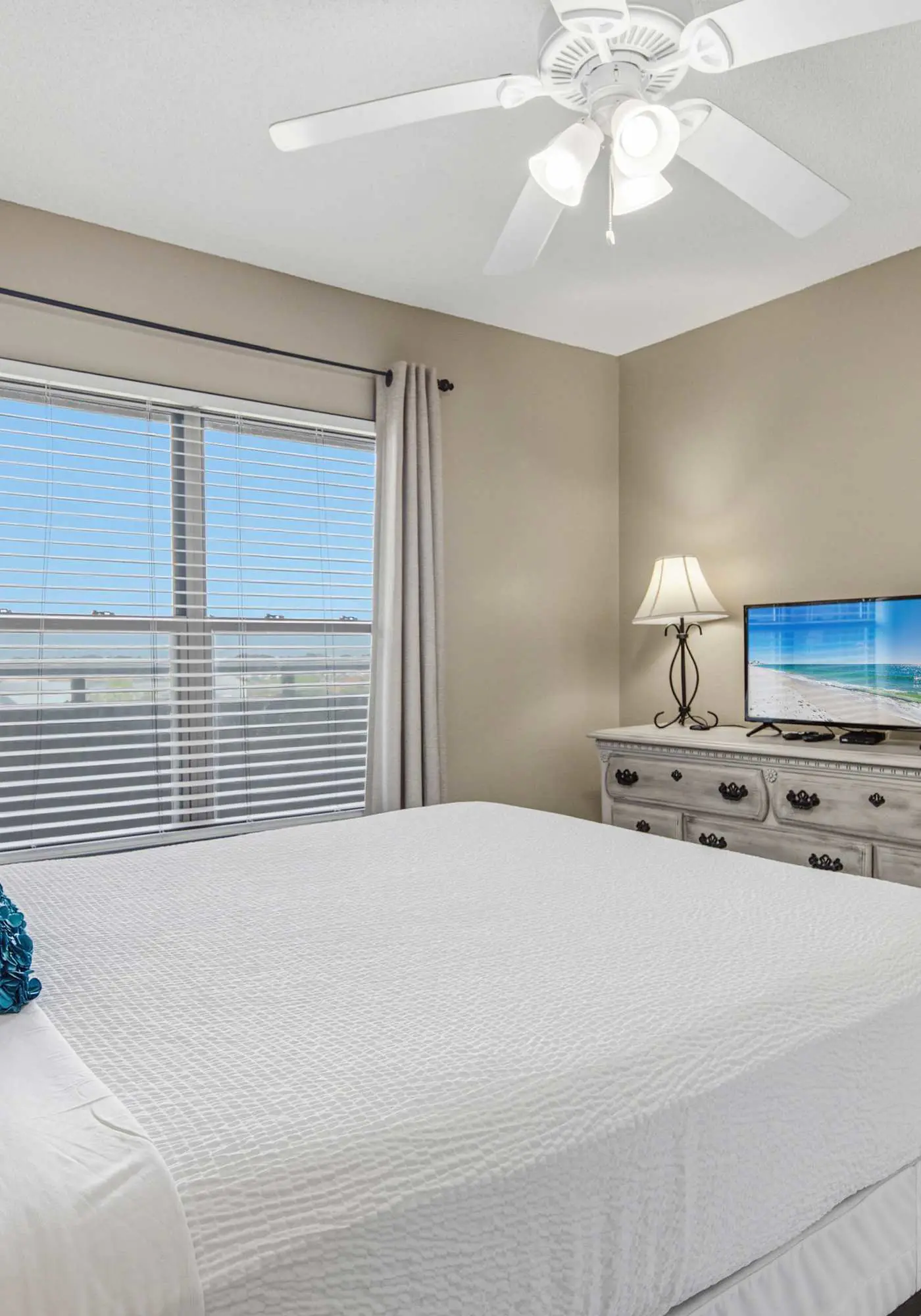 Spacious beachfront condo with full kitchen, shared pool and beach access