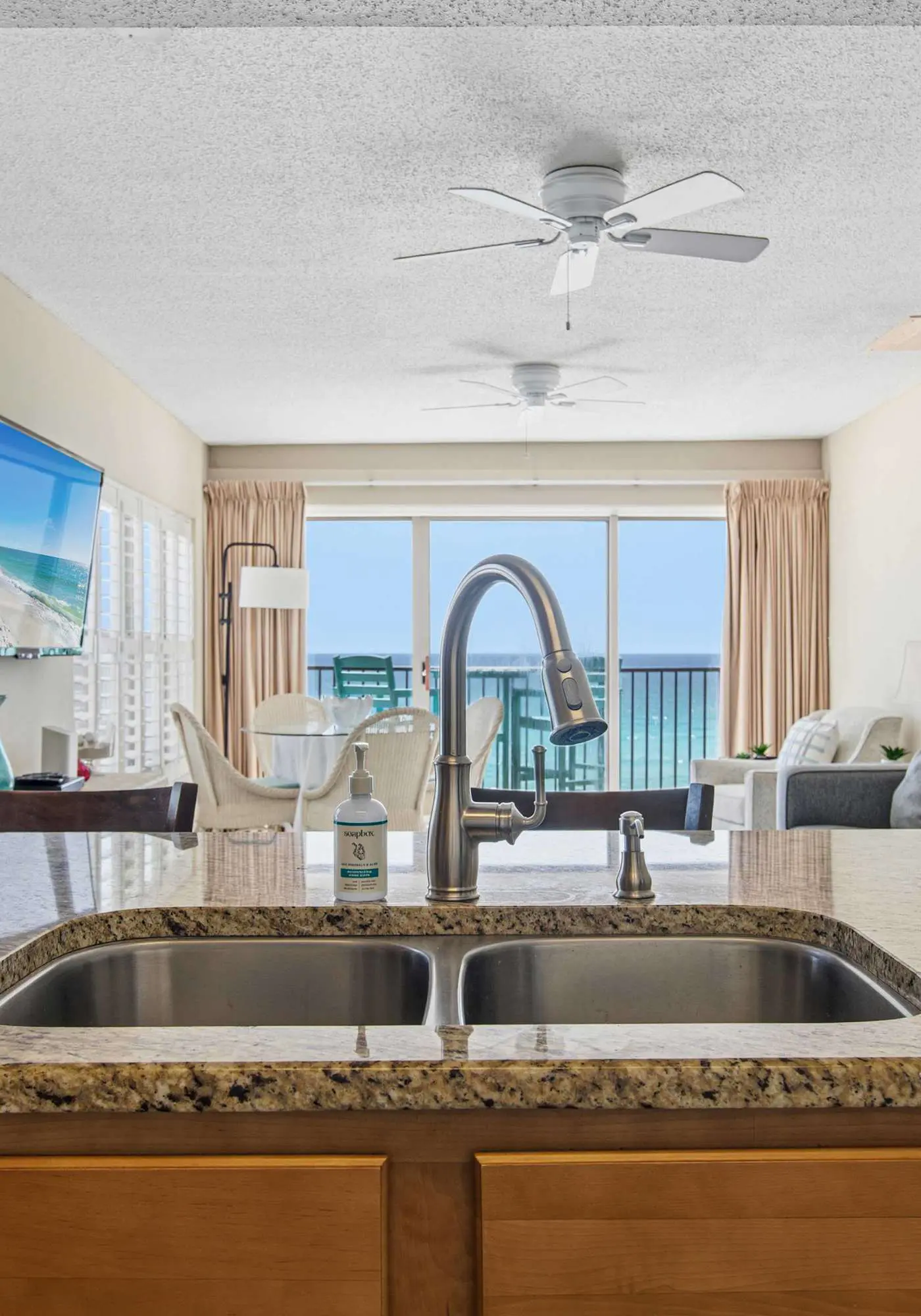 Spacious beachfront condo with full kitchen, shared pool and beach access