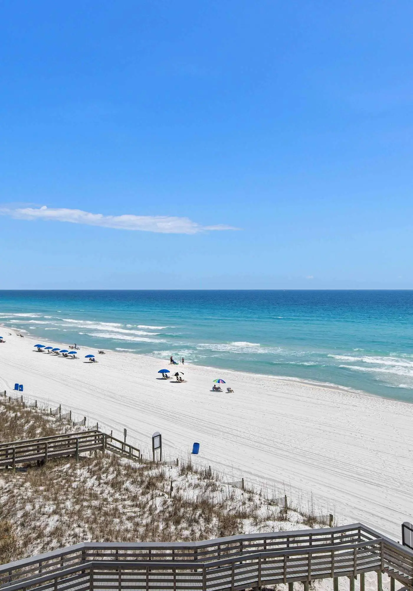 Spacious beachfront condo with full kitchen, shared pool and beach access