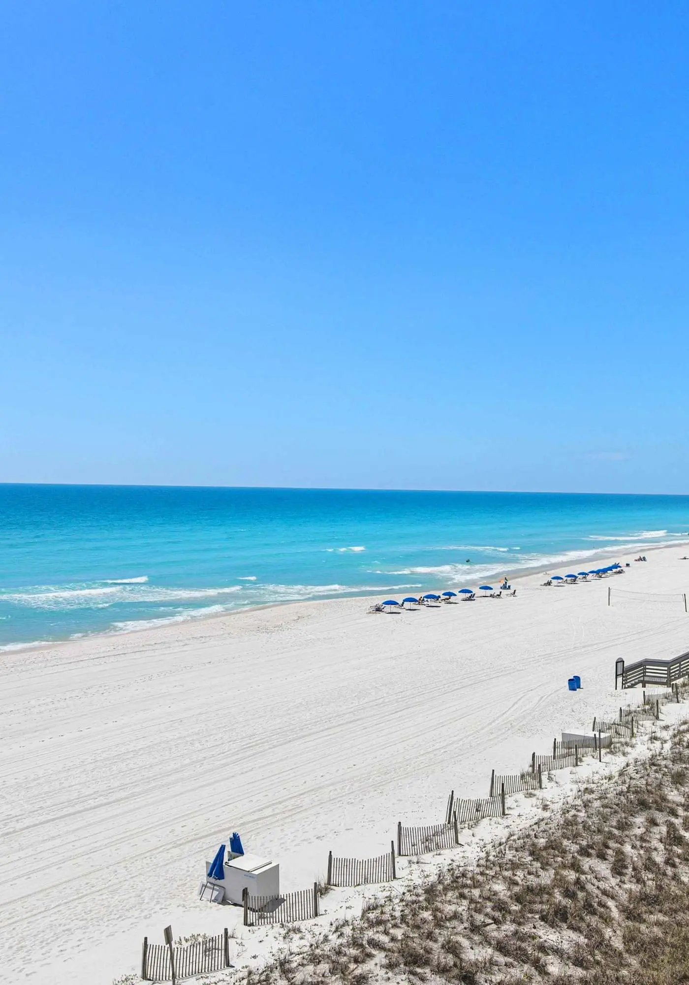Spacious beachfront condo with full kitchen, shared pool and beach access