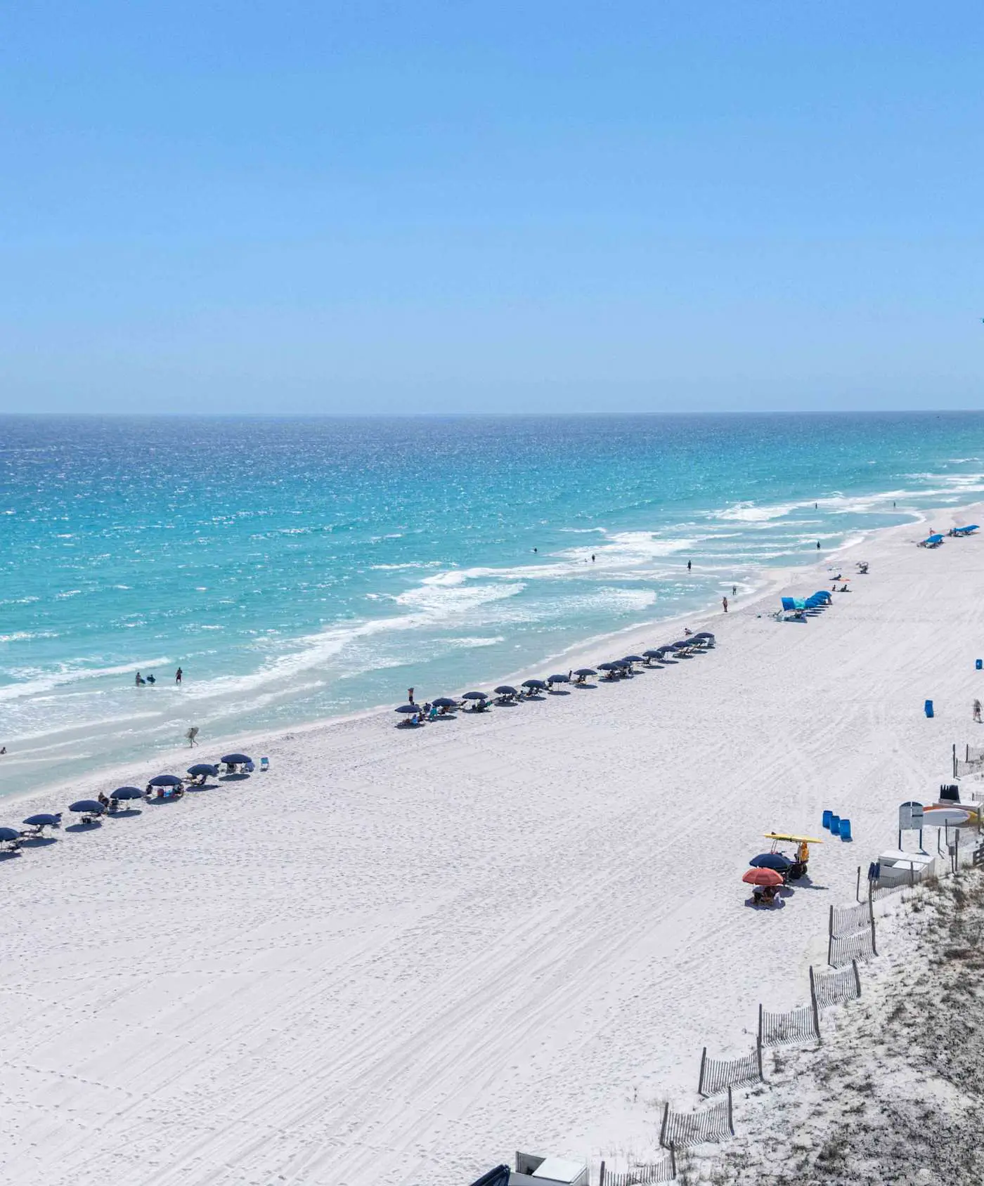 Spacious beachfront condo with full kitchen, shared pool and beach access
