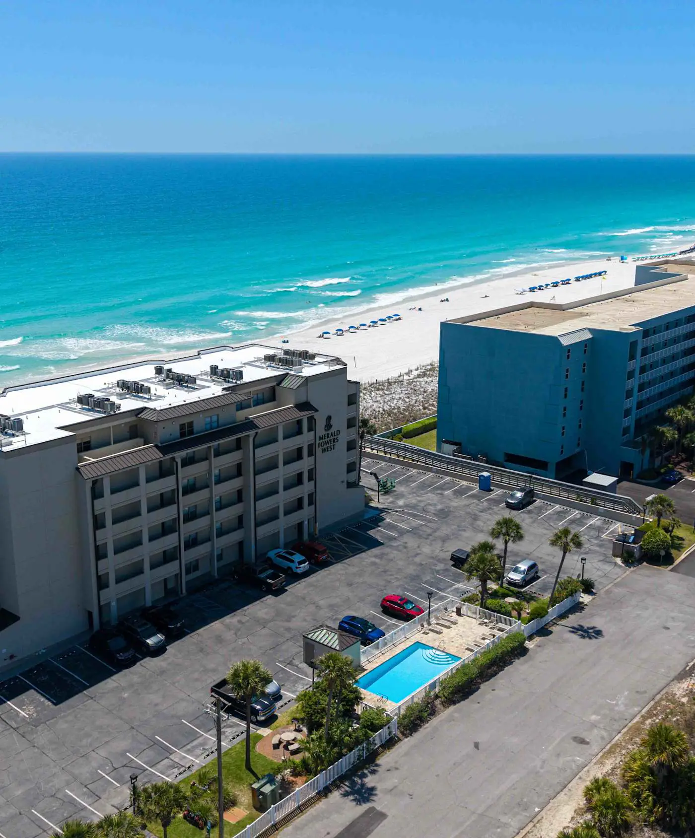 Spacious beachfront condo with full kitchen, shared pool and beach access
