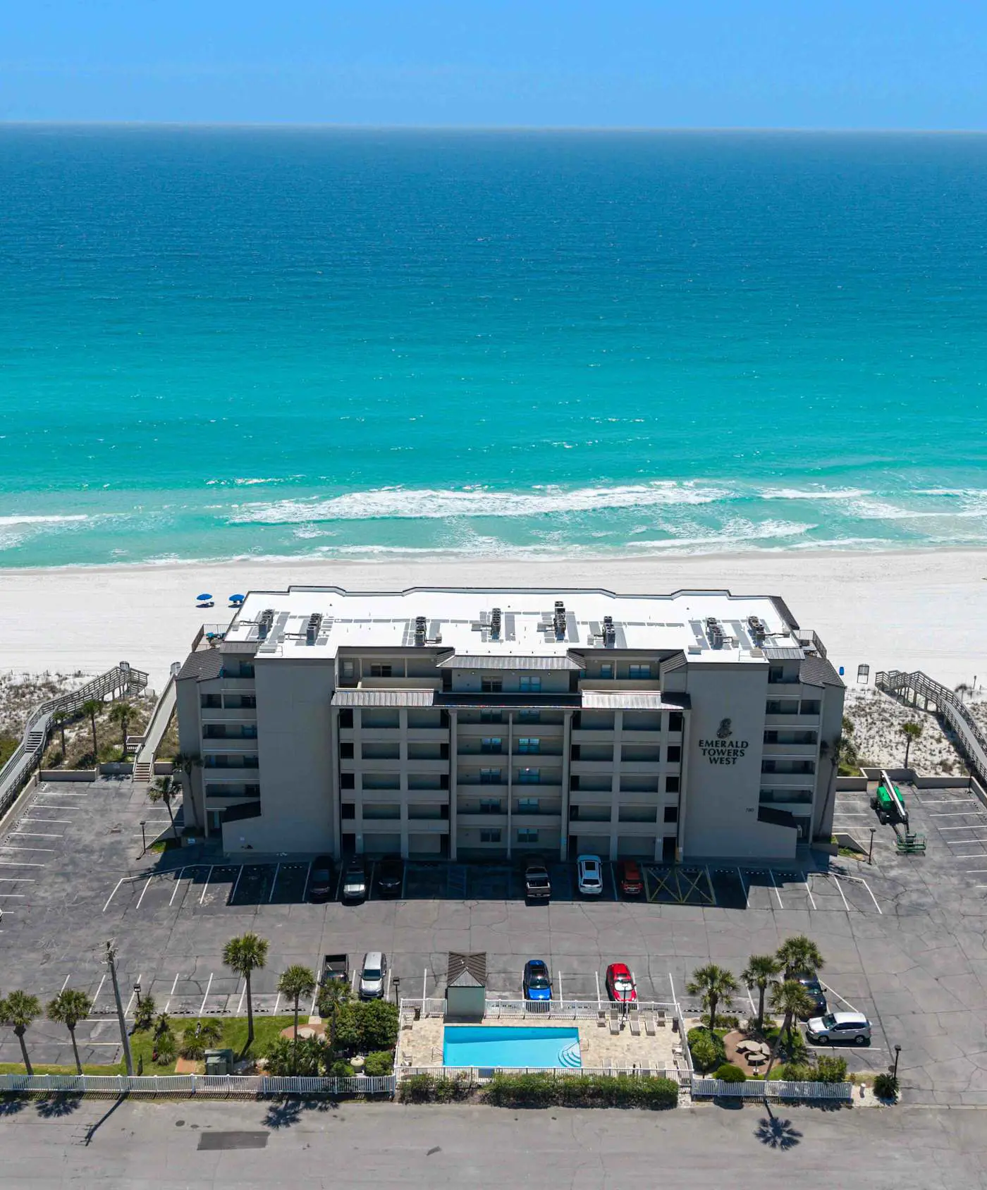Spacious beachfront condo with full kitchen, shared pool and beach access