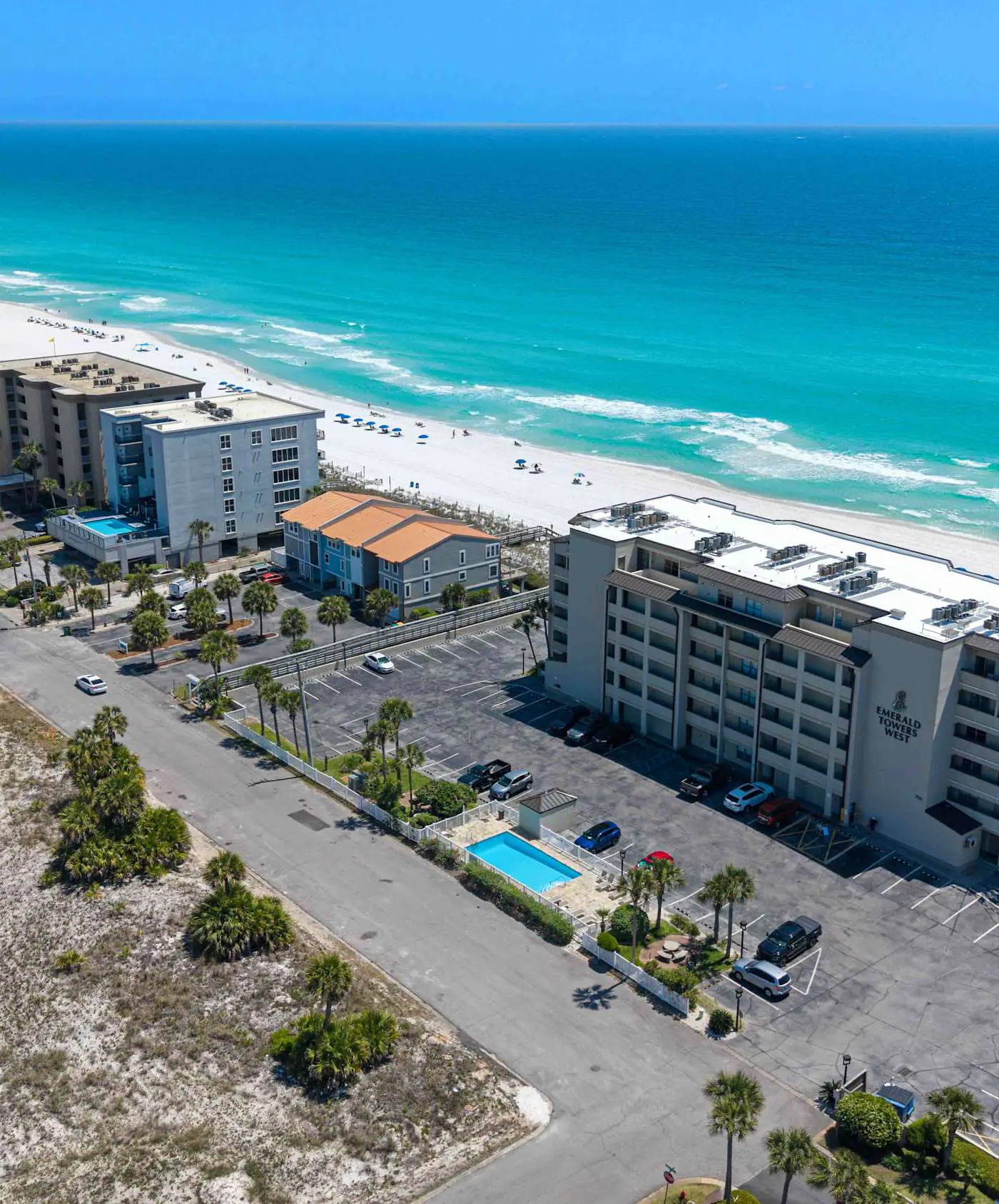 Spacious beachfront condo with full kitchen, shared pool and beach access