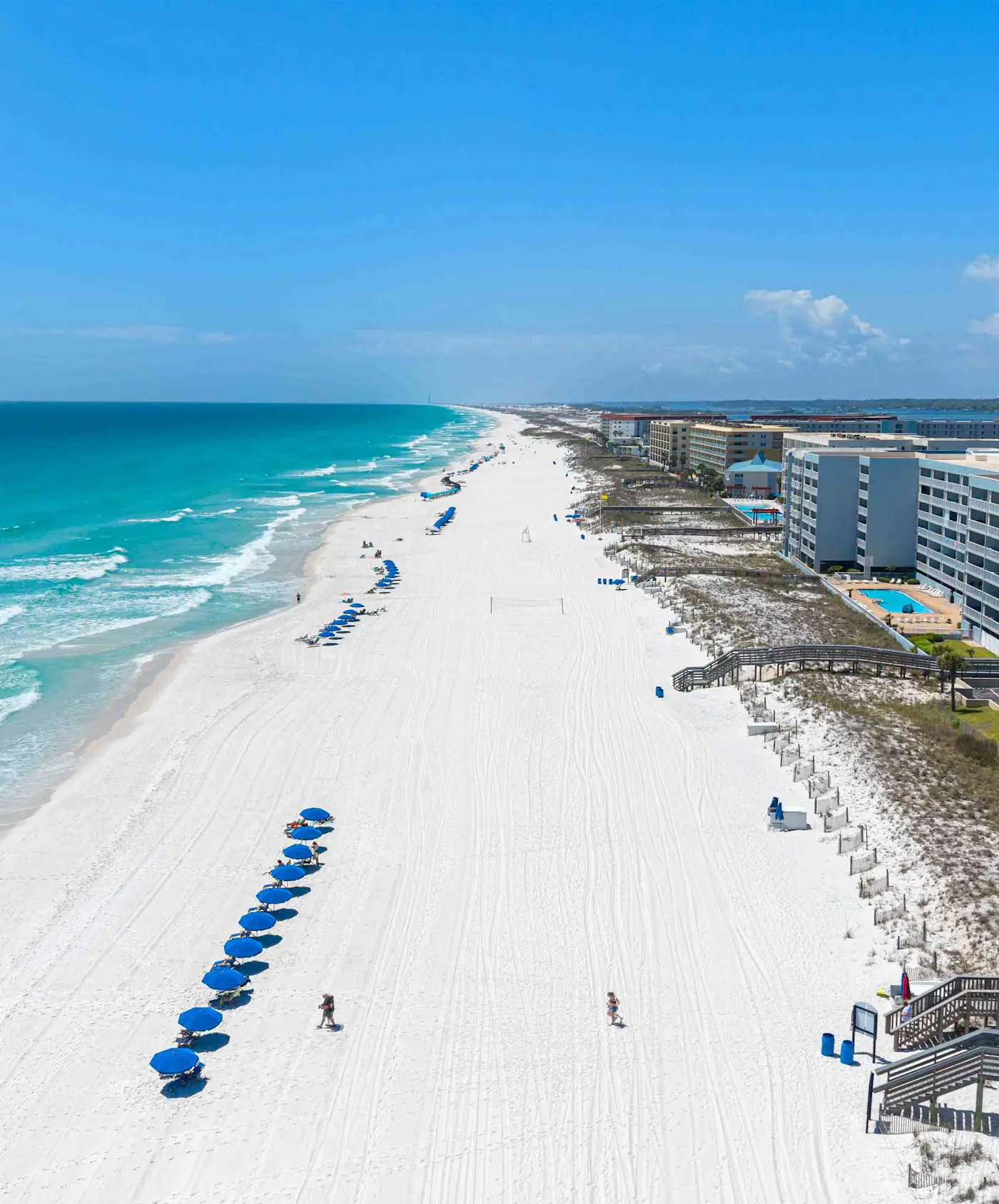 Spacious beachfront condo with full kitchen, shared pool and beach access