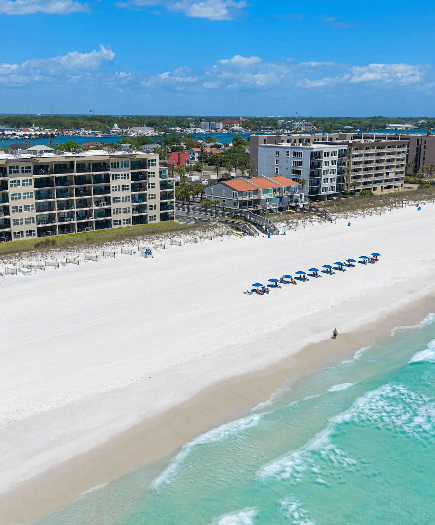 Spacious beachfront condo with full kitchen, shared pool and beach access