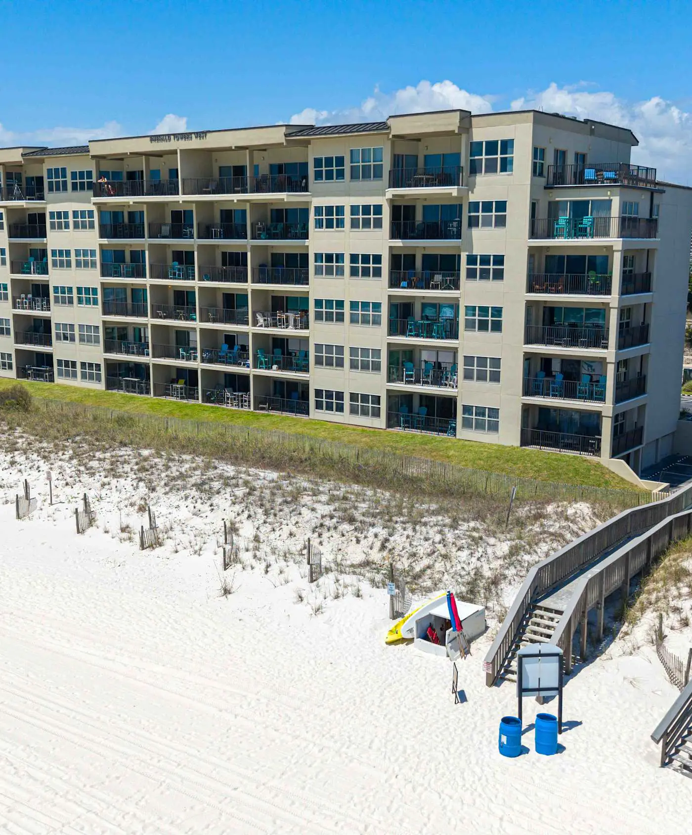 Spacious beachfront condo with full kitchen, shared pool and beach access