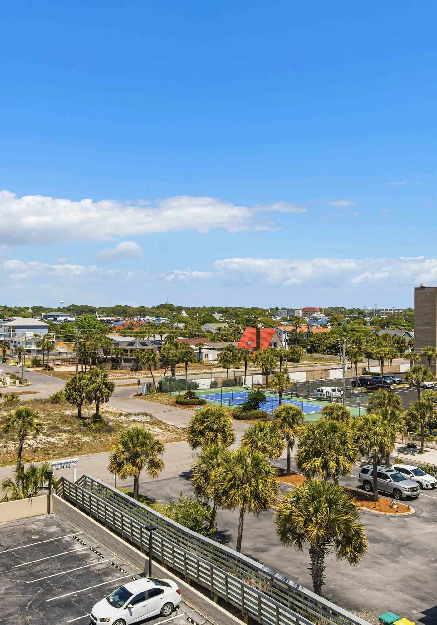 Spacious beachfront condo with full kitchen, shared pool and beach access