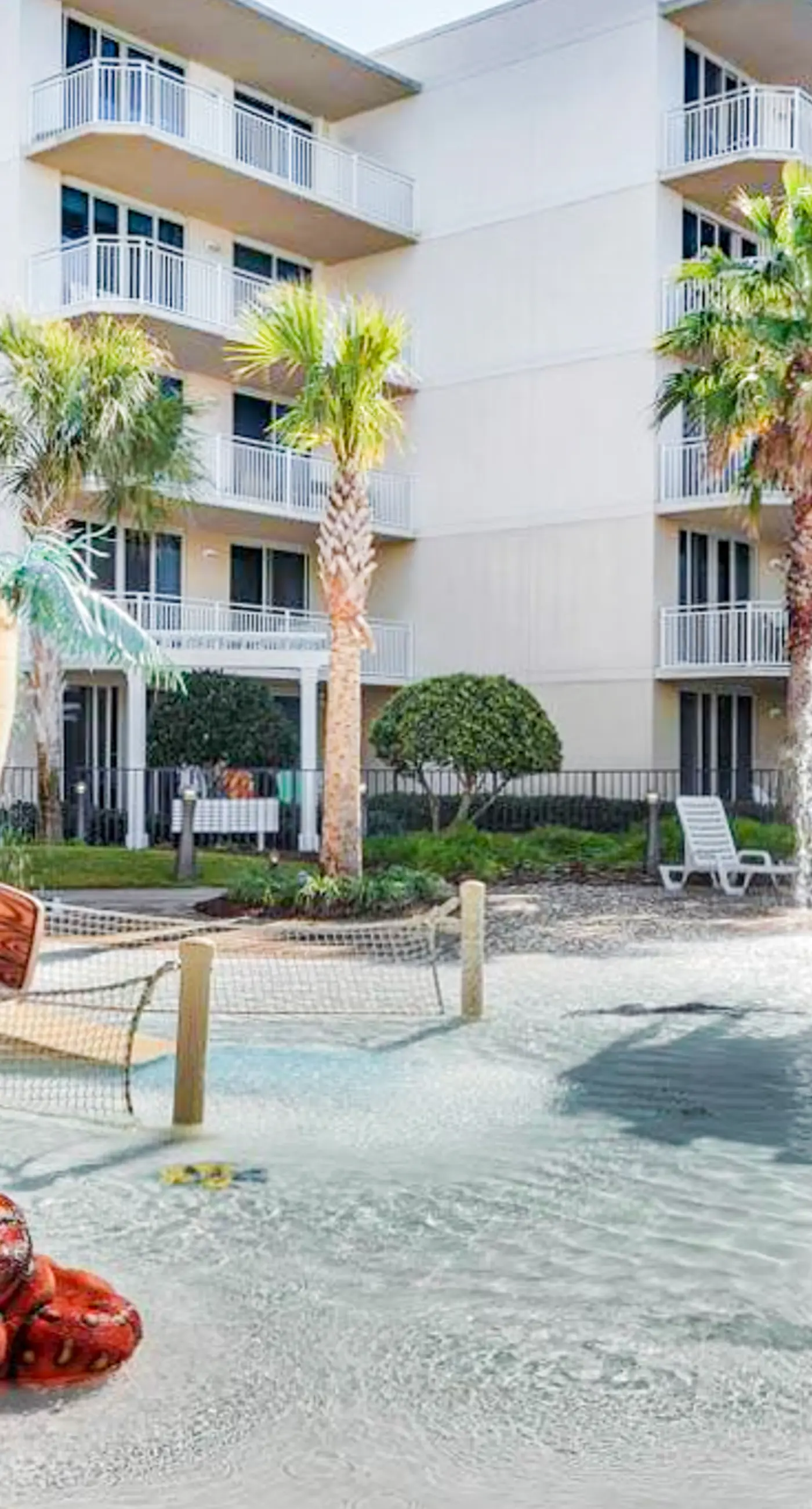 Sixth-floor condo with partial Gulf views, pools, hot tub, private beach