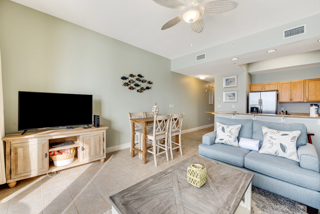 Stunning top-floor condo with balcony, pool, & beach access - great location