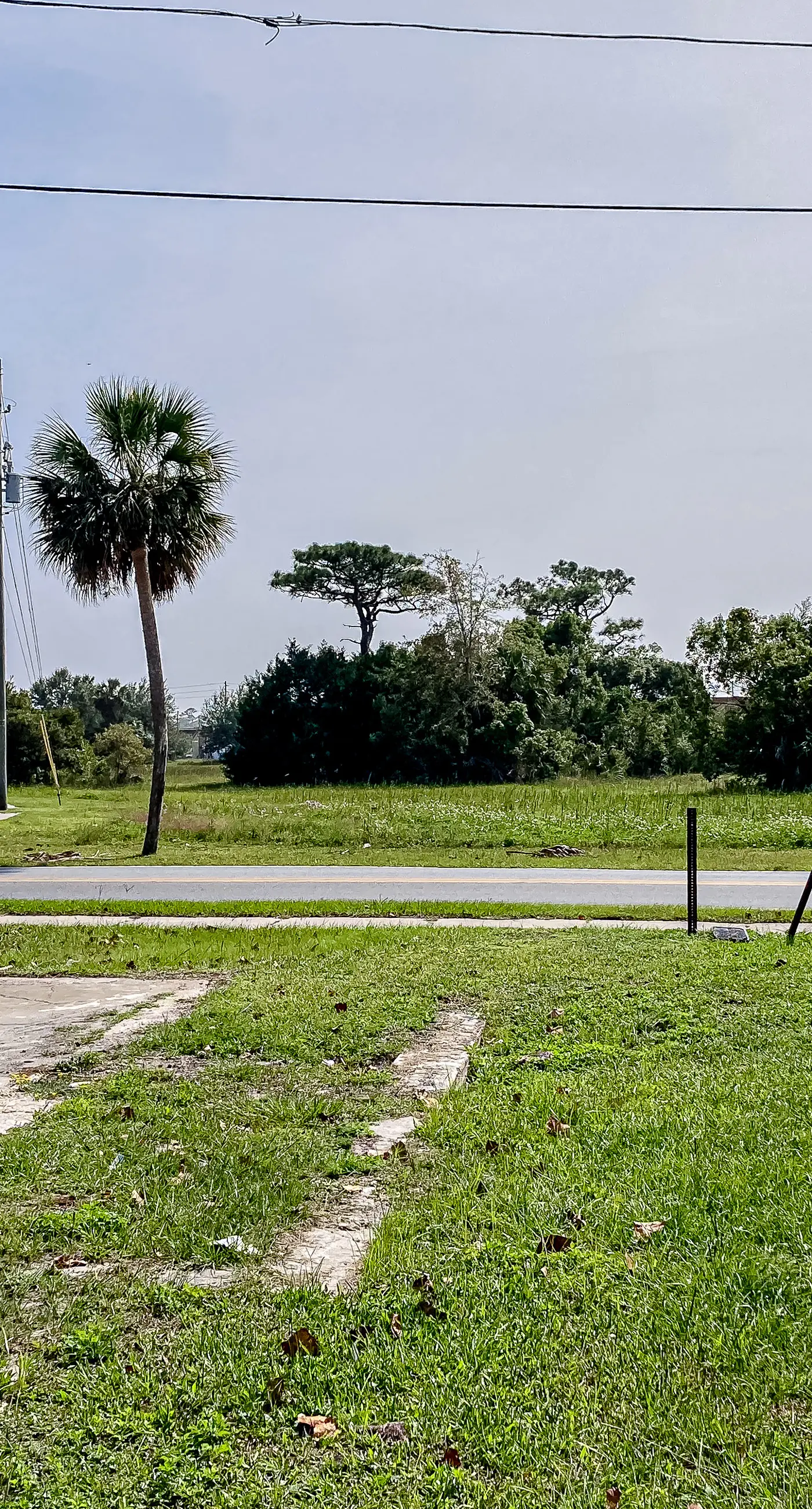 Dog-friendly coastal abode with a grill, central AC, updated interior & patio