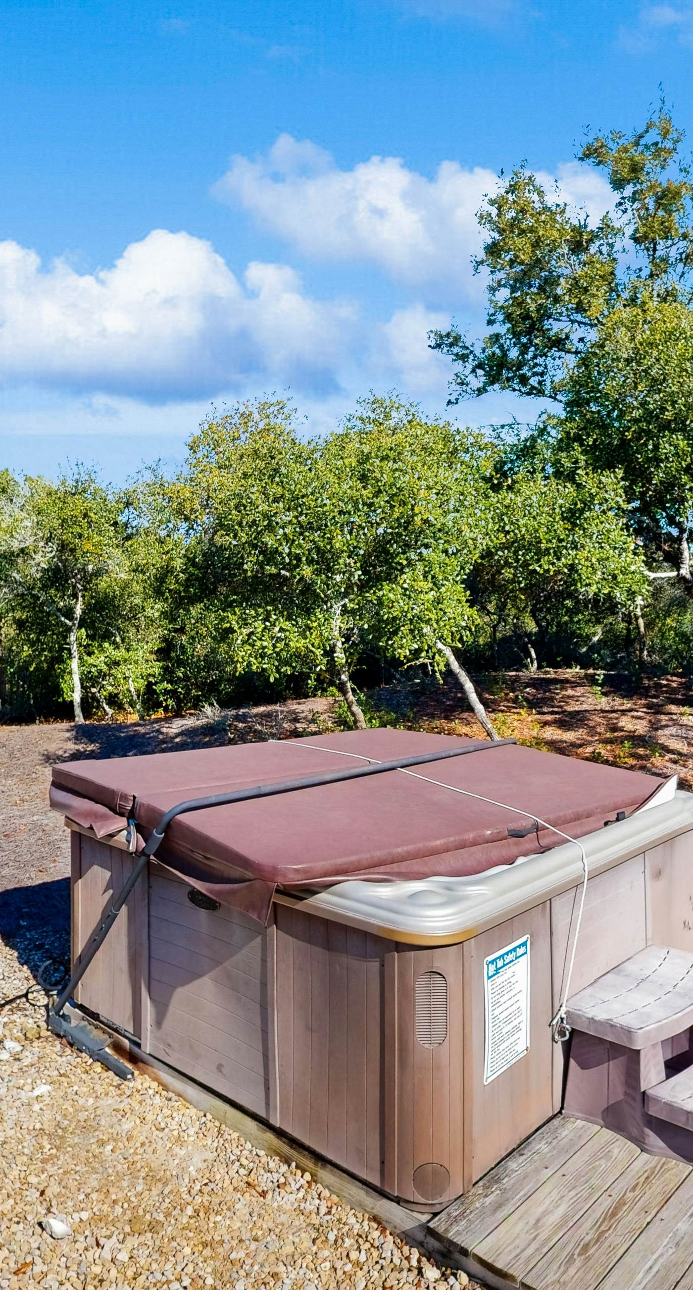 Coastal hideaway with a hot tub, outdoor shower, firepit, & deck - dog-friendly