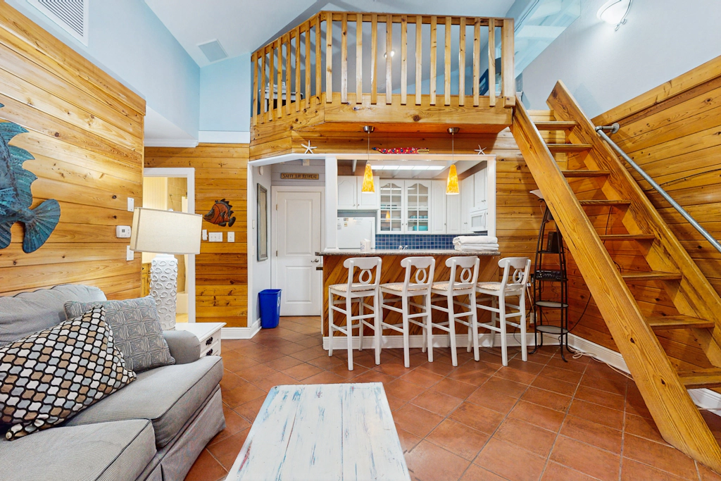 Cozy coastal condo with loft, shared pool and beach access