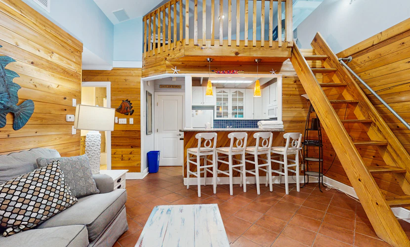 Cozy coastal condo with loft, shared pool and beach access