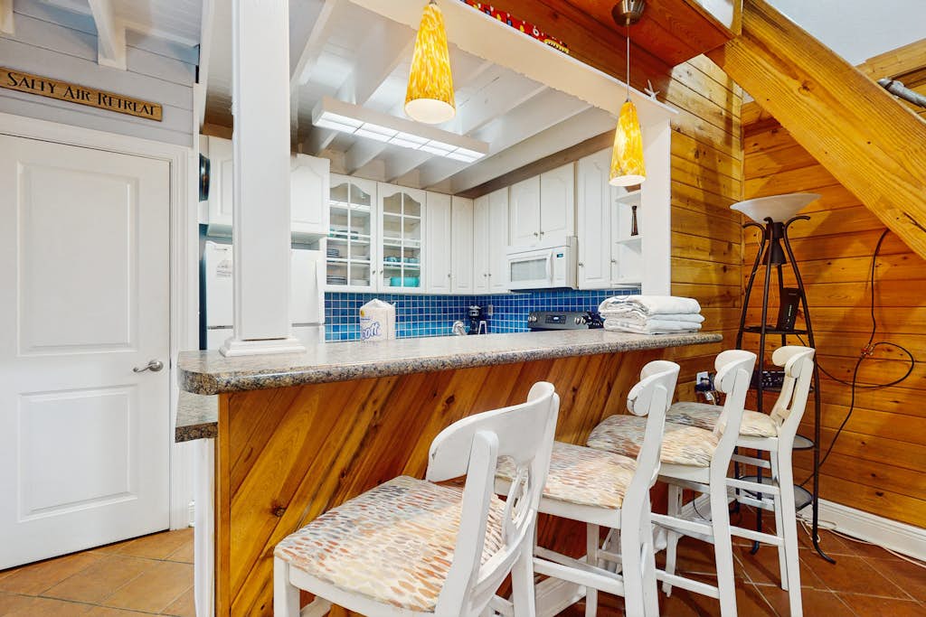 Cozy coastal condo with loft,  shared pool and beach access
