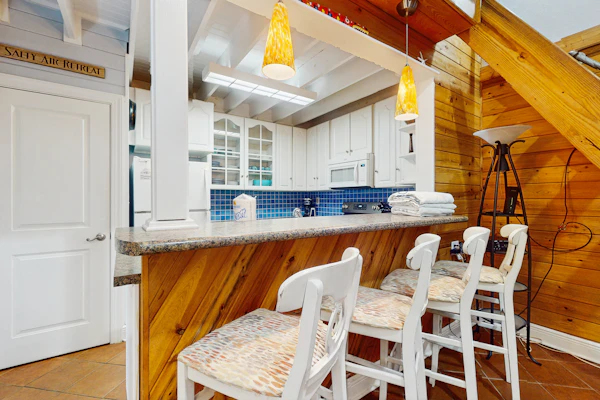 Cozy coastal condo with loft, shared pool and beach access