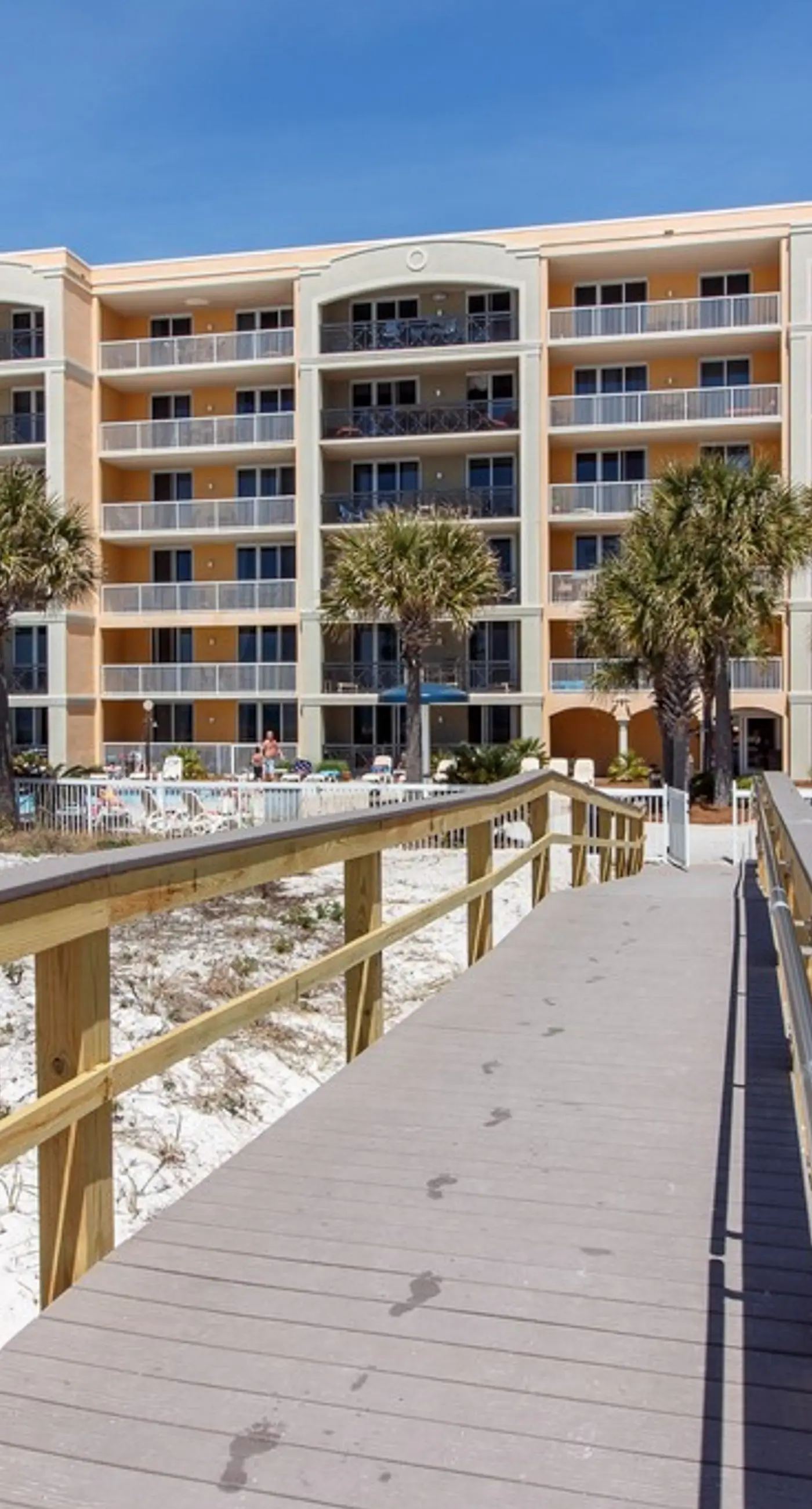 gulf front condo steps from the sand with shared pool,hot tub & more
