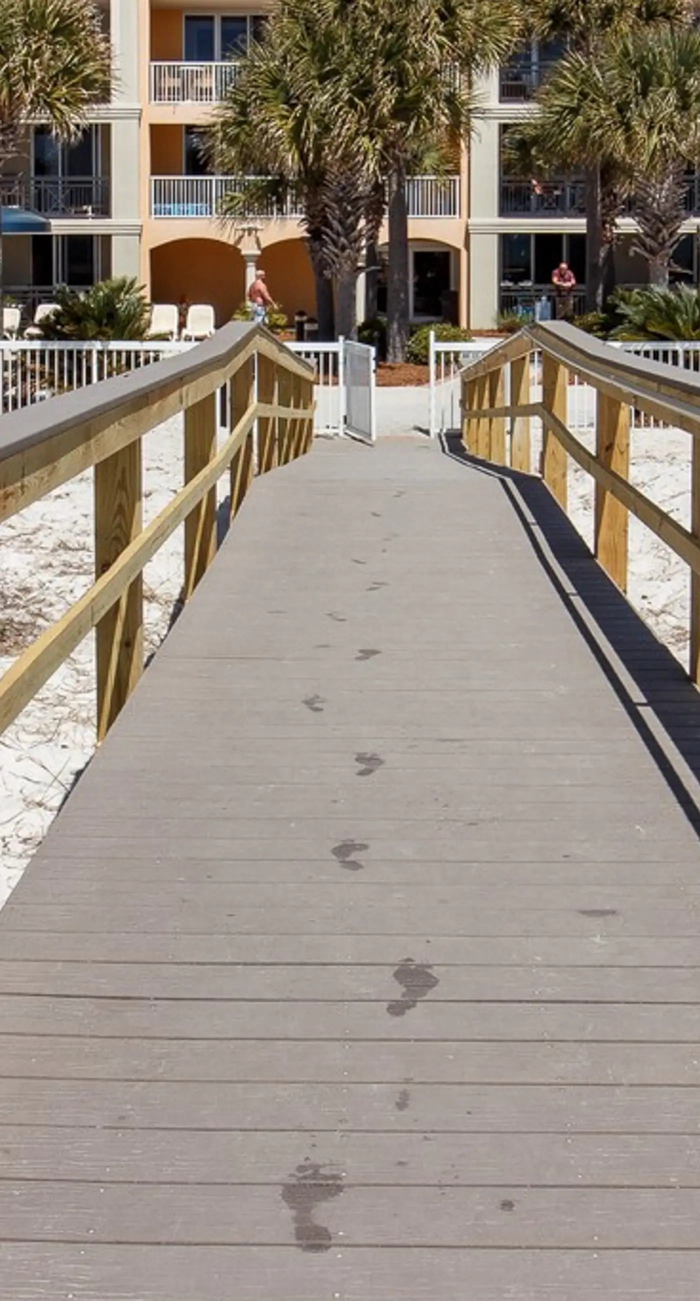 gulf front condo steps from the sand with shared pool,hot tub & more
