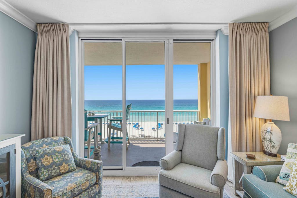 Enchanting oceanfront condo with pool, balcony, fitness area, & washer&dryer