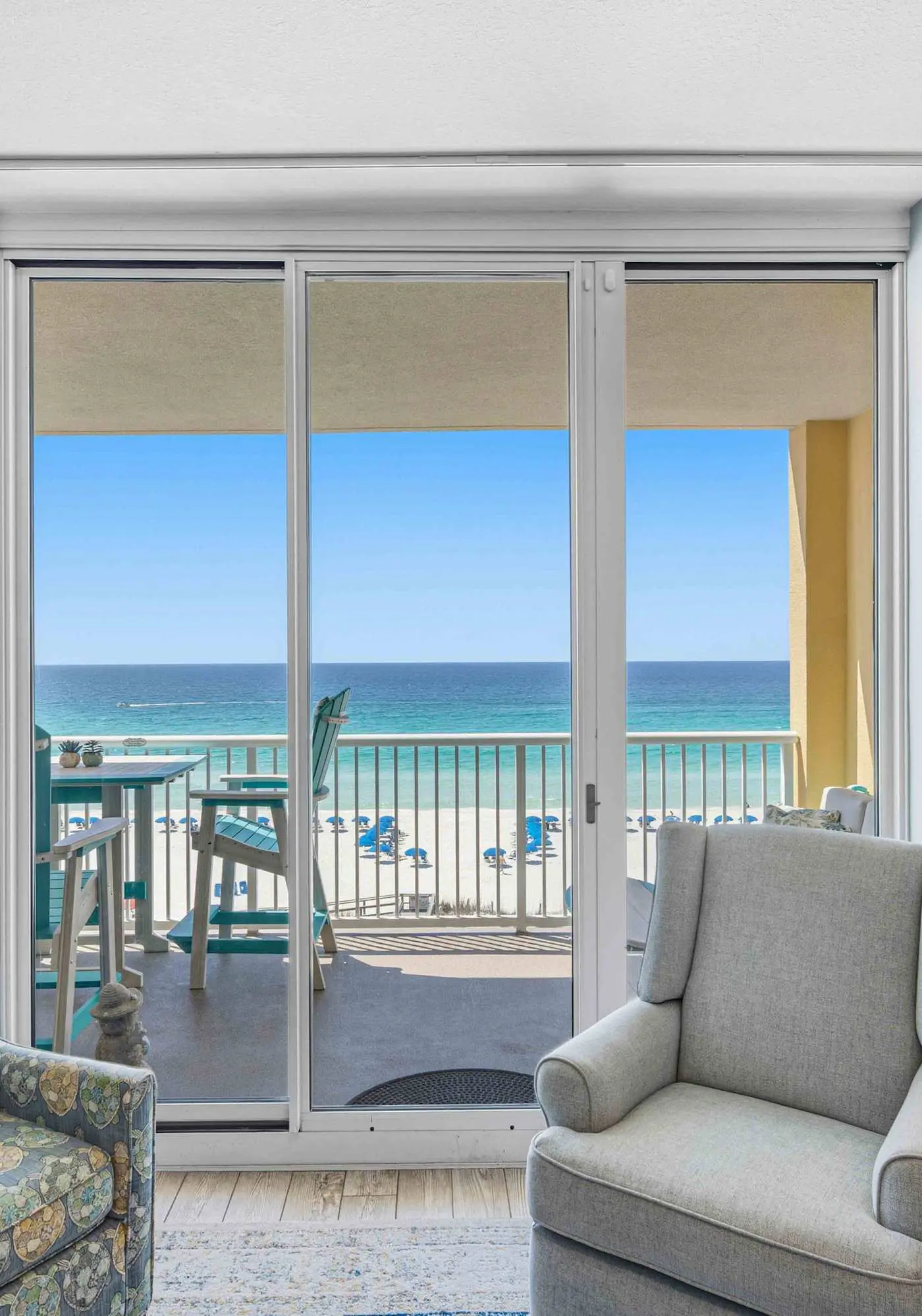 Enchanting oceanfront condo with pool, balcony, fitness area, & washer&dryer
