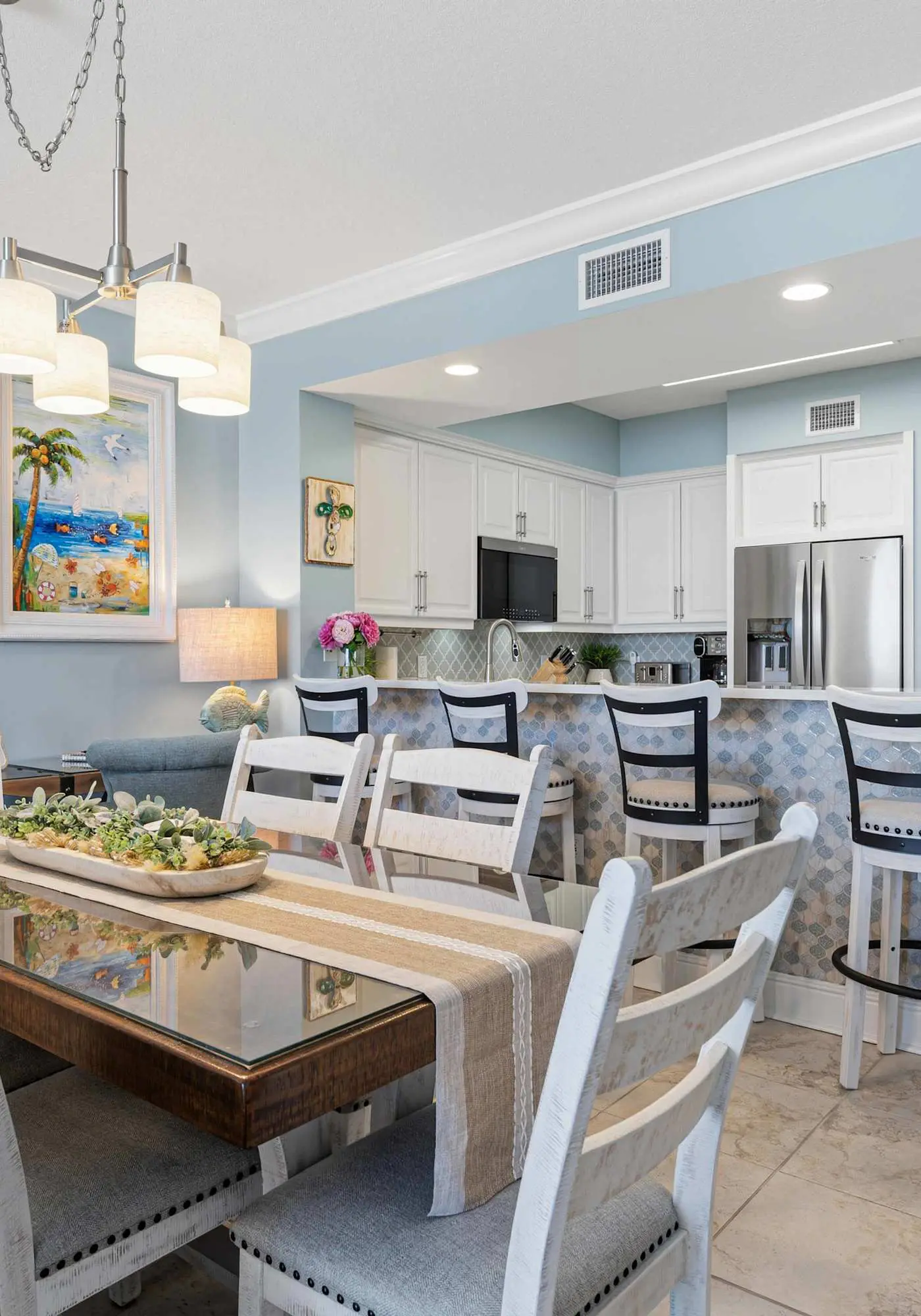 Enchanting oceanfront condo with pool, balcony, fitness area, & washer&dryer