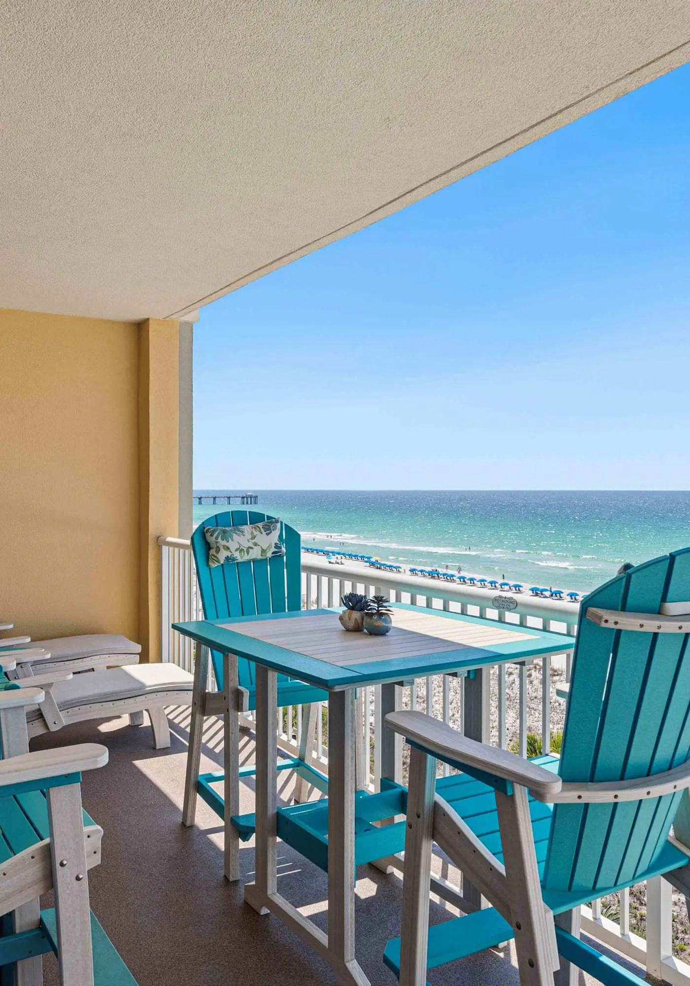 Enchanting oceanfront condo with pool, balcony, fitness area, & washer&dryer