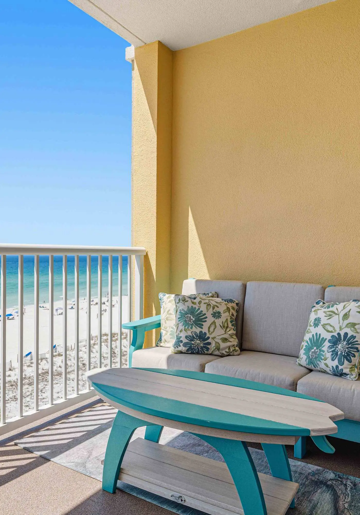 Enchanting oceanfront condo with pool, balcony, fitness area, & washer&dryer