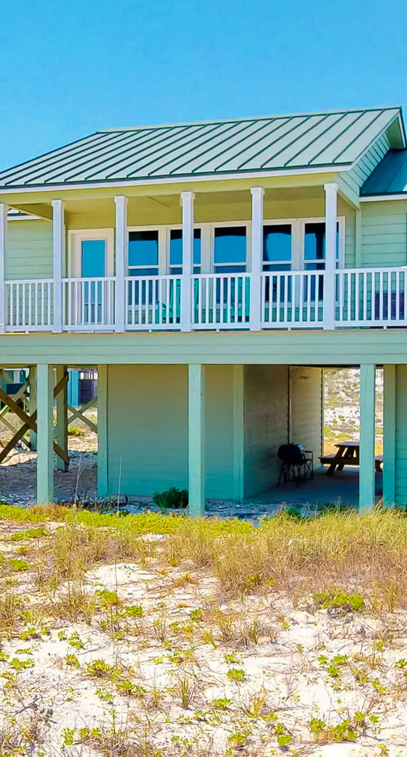 Dog-friendly beachfront bungalow with gorgeous views, outdoor shower, and deck
