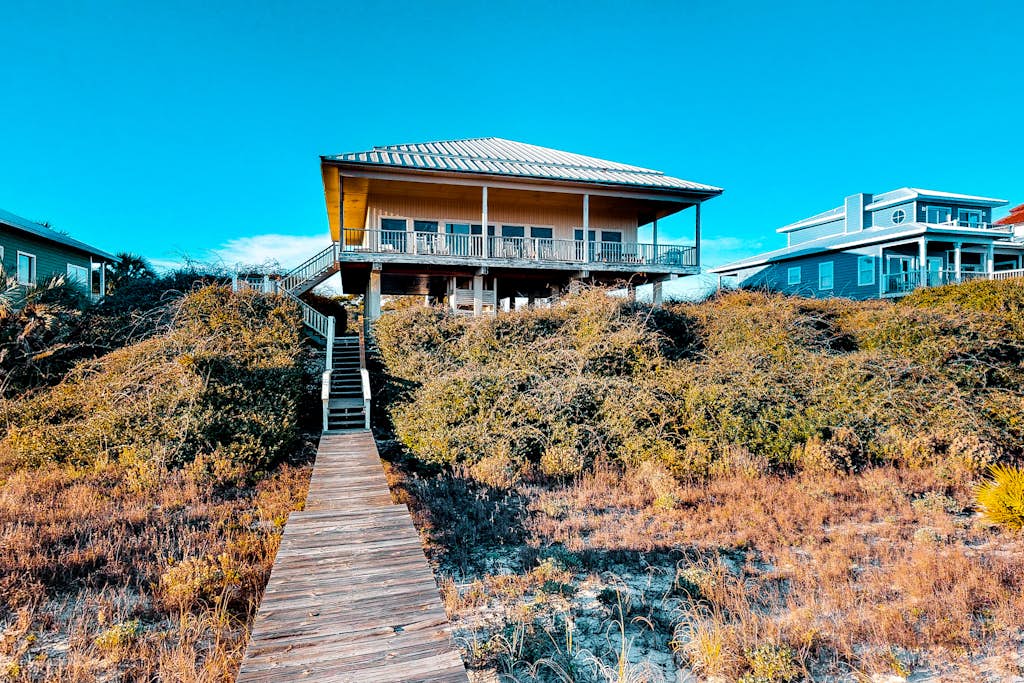 Beachfront dog-friendly home with private hot tub, boardwalk, on-site pools, gym