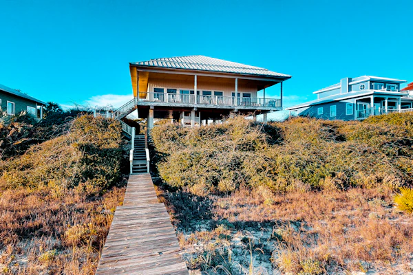Beachfront dog-friendly home with private hot tub, boardwalk, on-site pools, gym