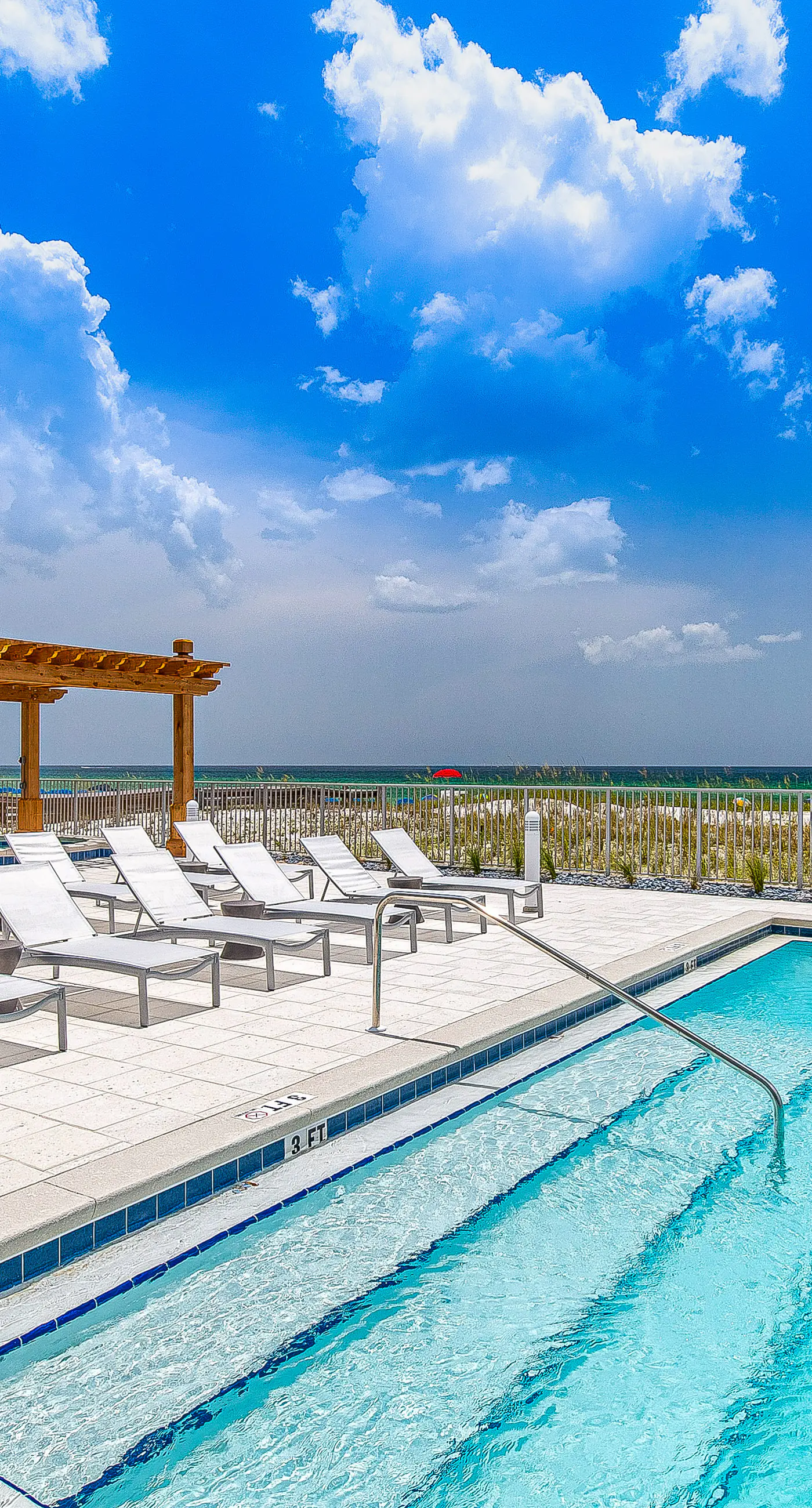 Third-floor, Gulf-view condo with pool and hot tub access, central AC, & W&D