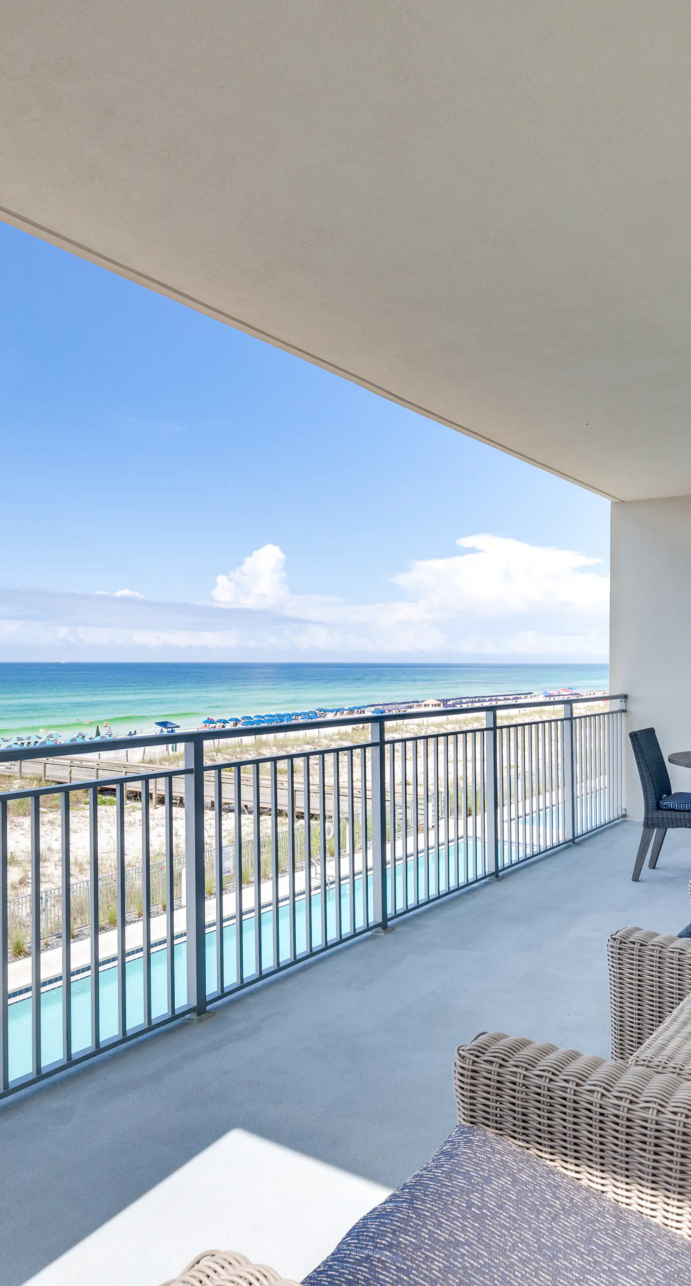 Third-floor, Gulf-view condo with pool and hot tub access, central AC, & W&D