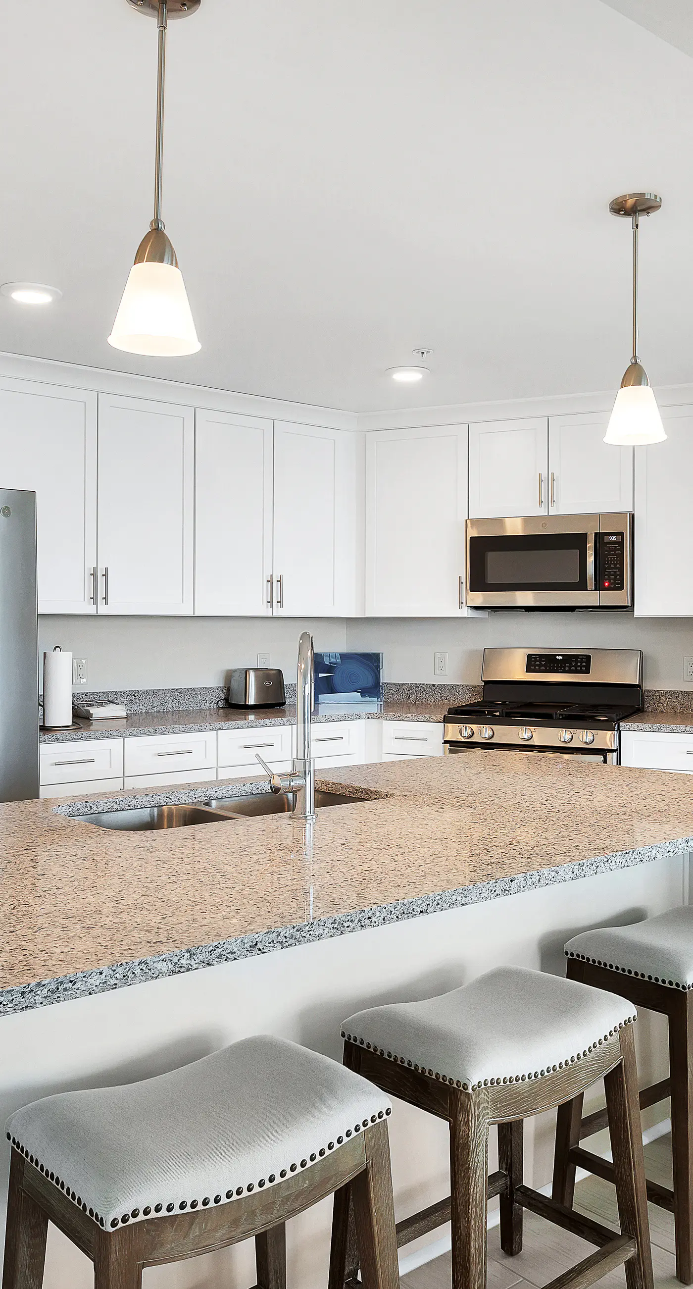 Third-floor, Gulf-view condo with pool and hot tub access, central AC, & W&D