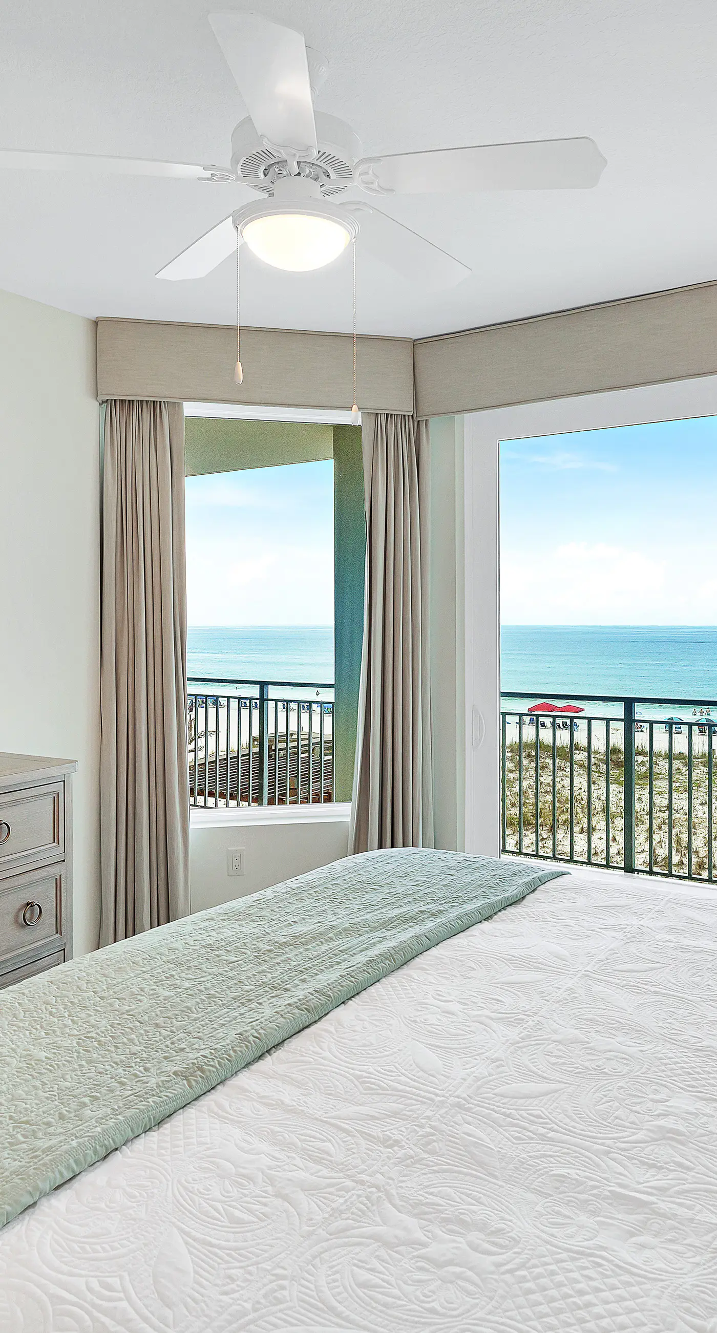 Third-floor, Gulf-view condo with pool and hot tub access, central AC, & W&D