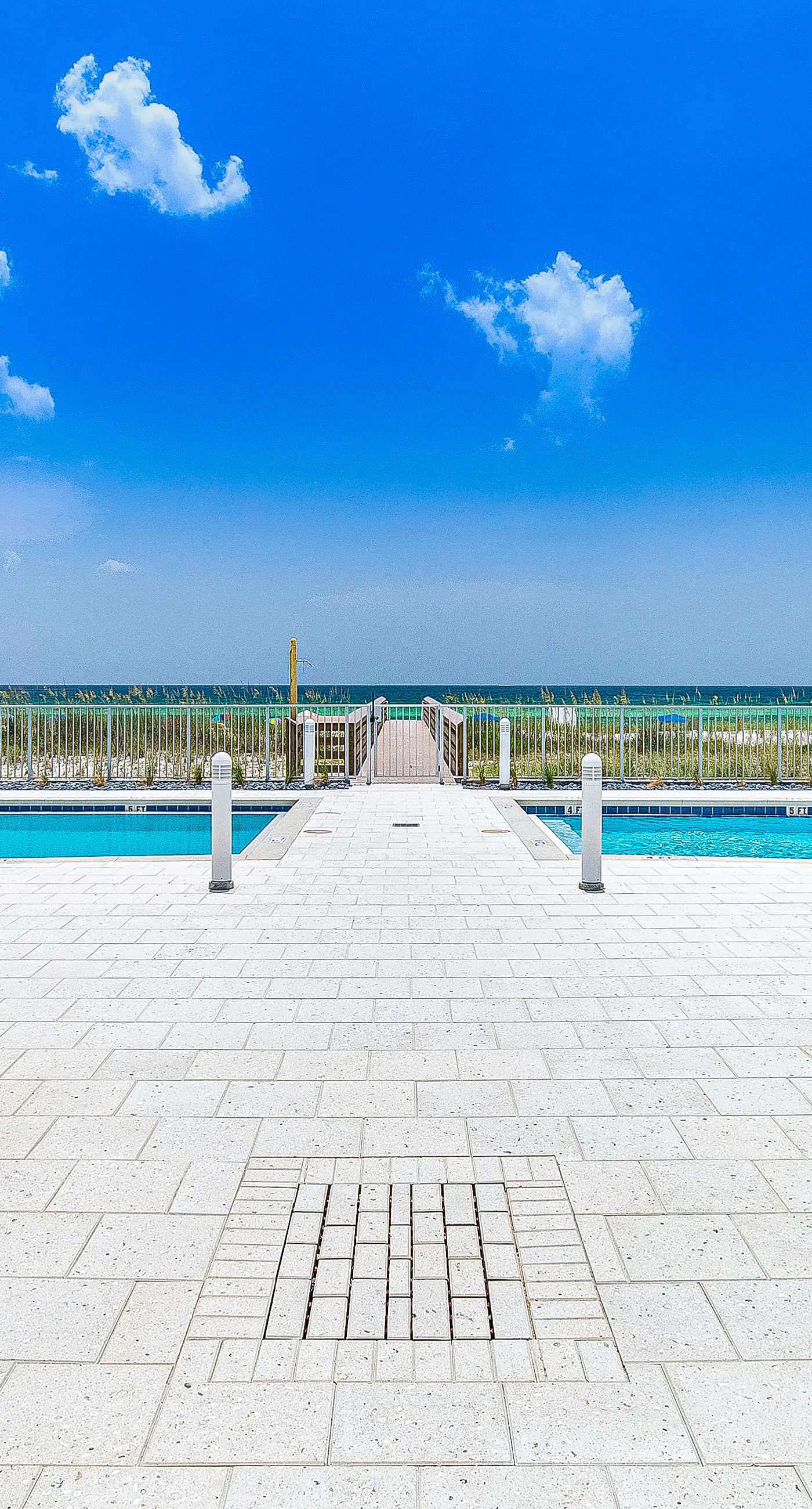 Third-floor, Gulf-view condo with pool and hot tub access, central AC, & W&D