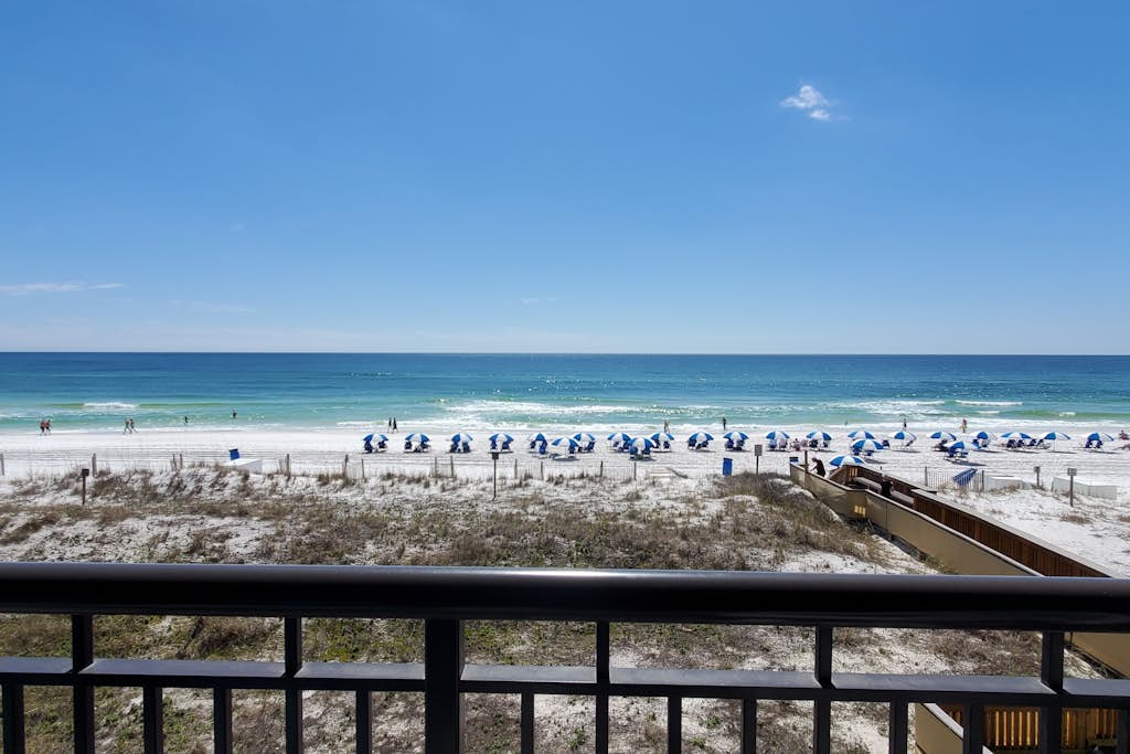 Island Echos 3G. Ocean view condo steps from the sand with balcony, pool & tennis