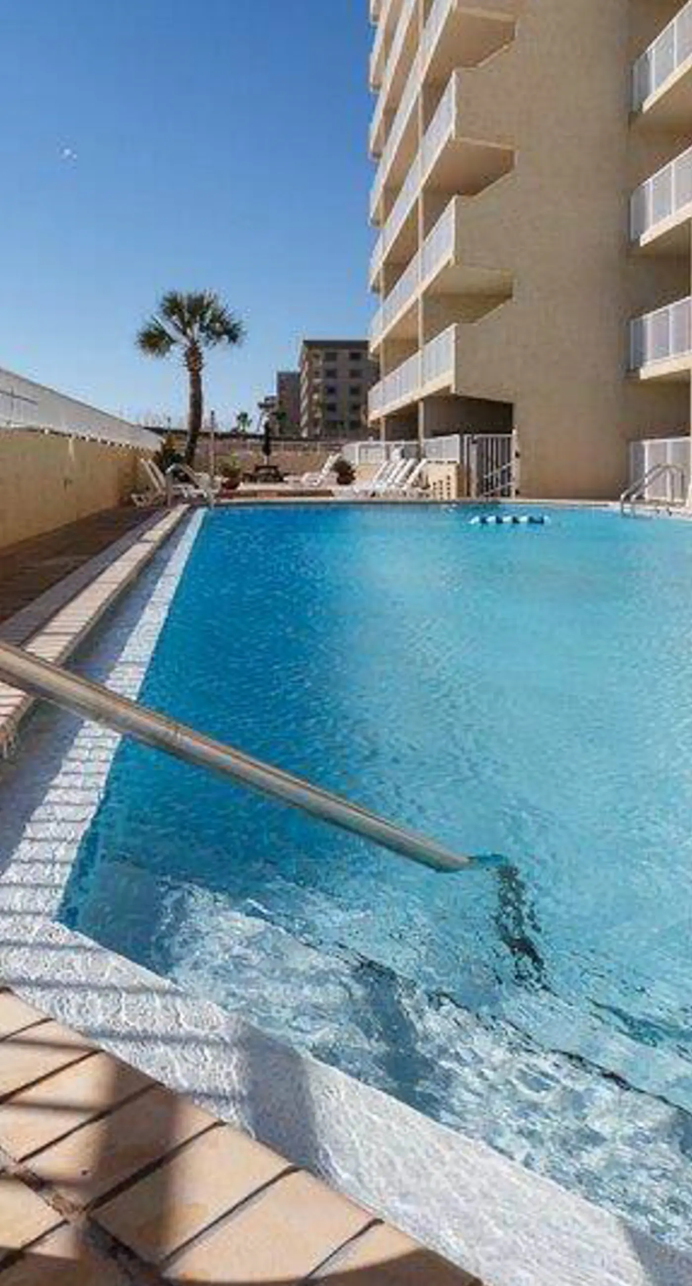 Relaxing Gulf-front condo with shared pool, balcony, & fitness room
