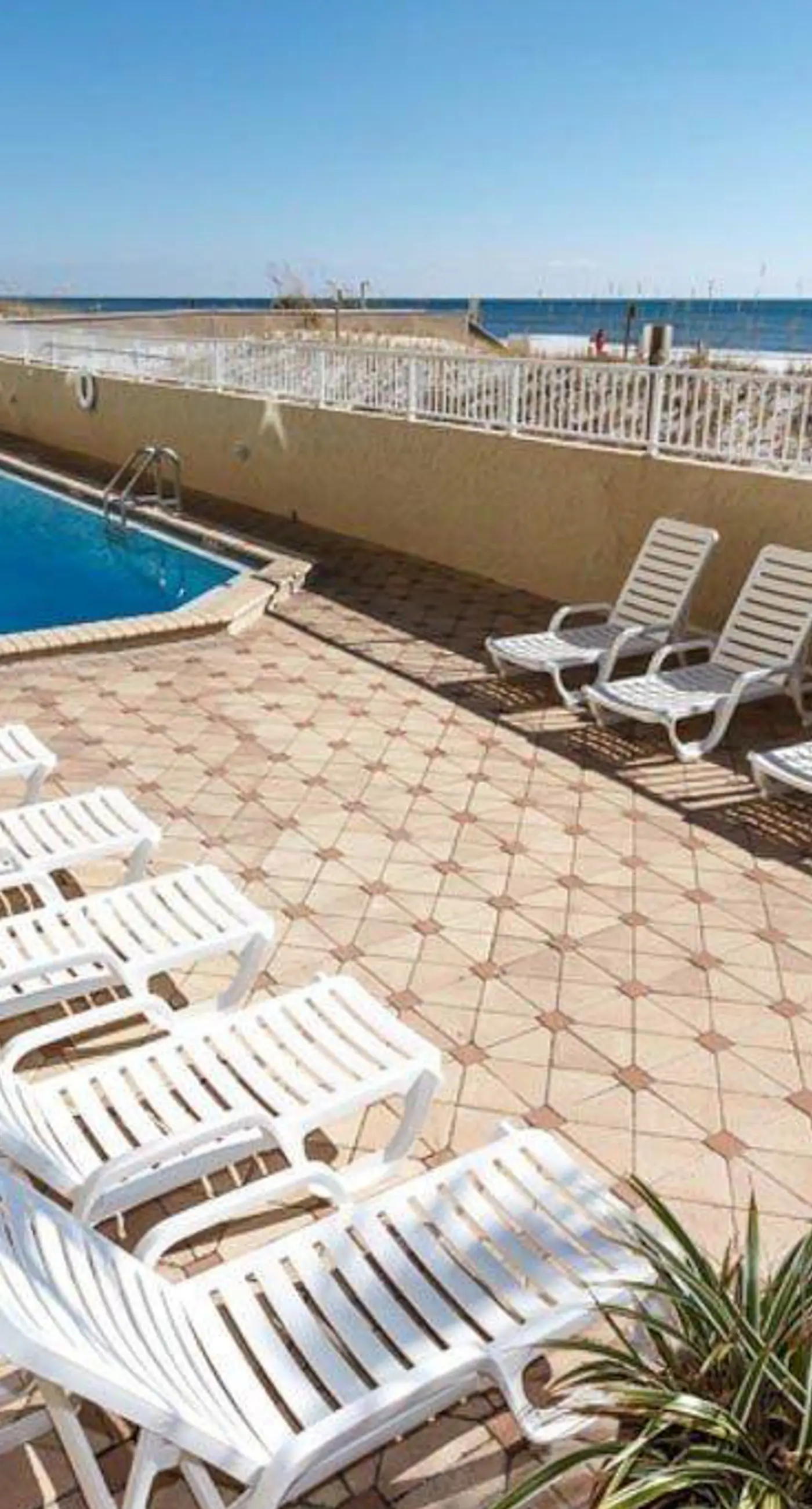 Relaxing Gulf-front condo with shared pool, balcony, & fitness room