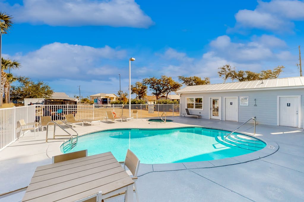 Water-view condo with hot tub, pool, fitness room & balcony - dog-friendly