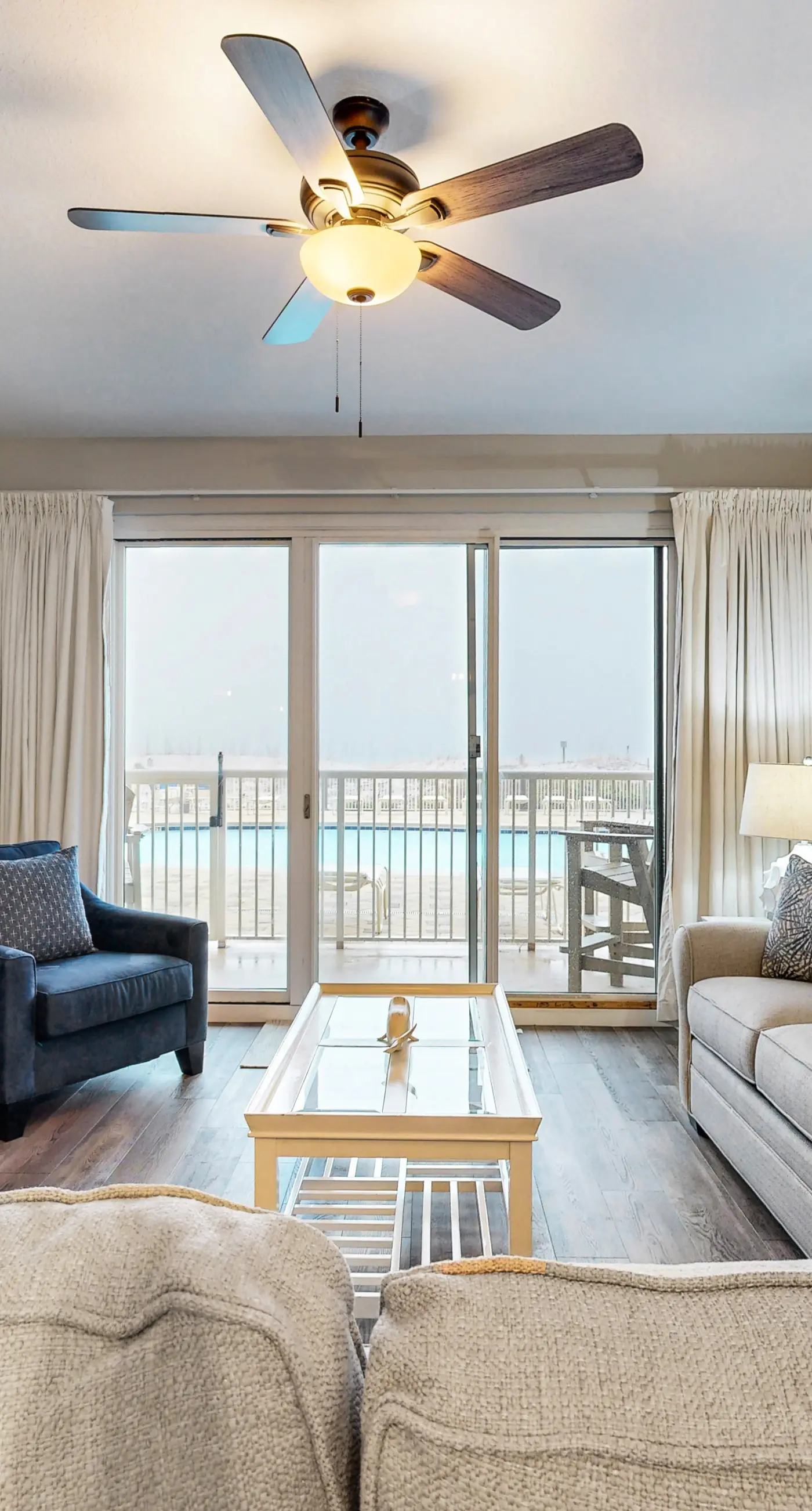 Gulf-front condo with washer/dryer, pools, hot tub, fitness room, & beach access