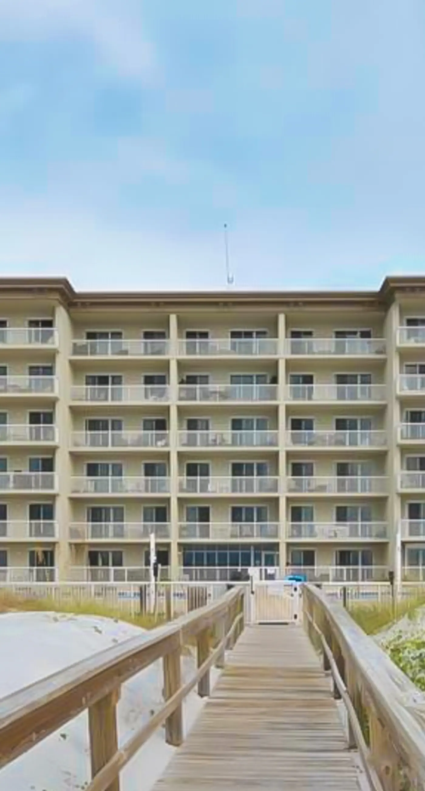 Gulf-front condo with washer/dryer, pools, hot tub, fitness room, & beach access