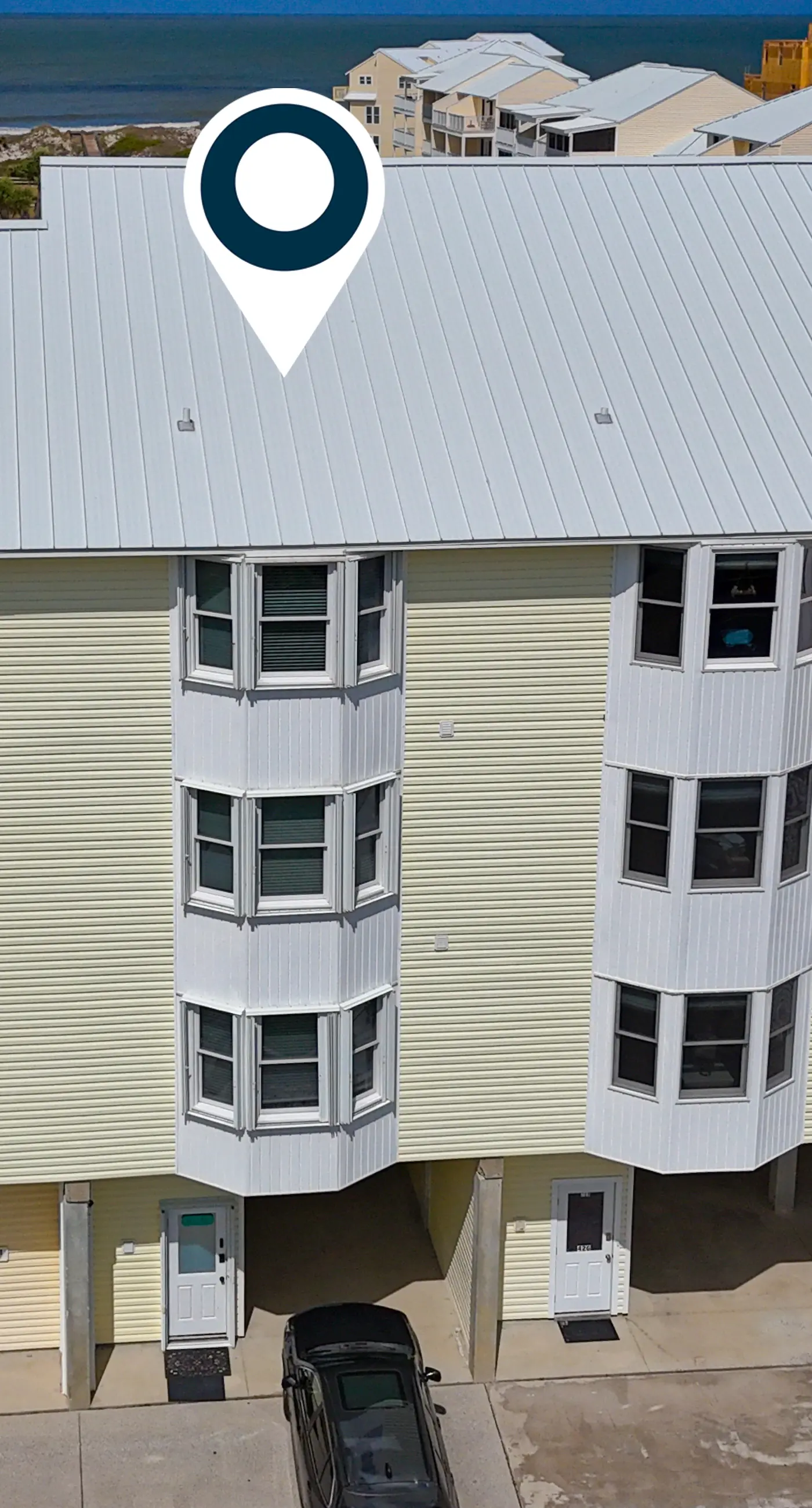 Four-Level Beachfront Townhome with Private Elevator, Free WiFi, & Shared Pool