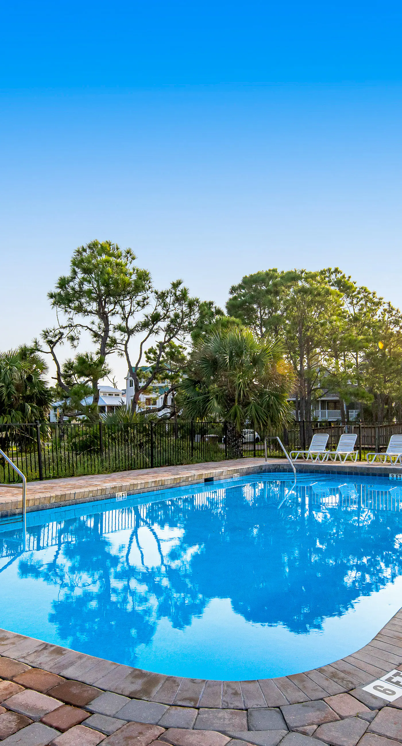 Spacious dog-friendly home with community pool, deck, & WiFi - minutes to beach