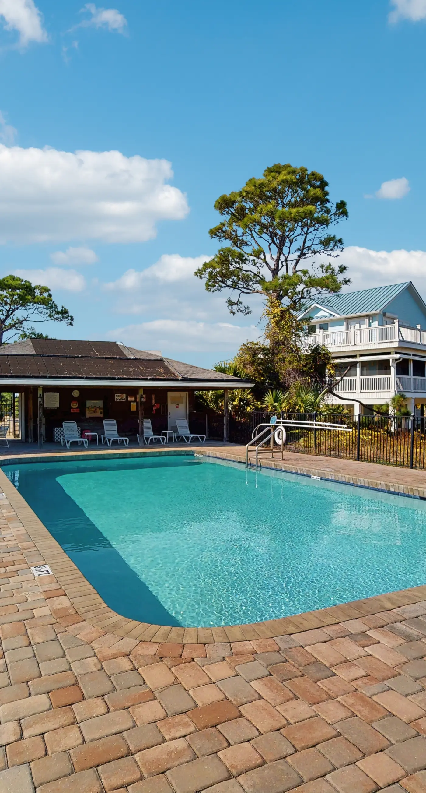 Spacious dog-friendly home with community pool, deck, & WiFi - minutes to beach