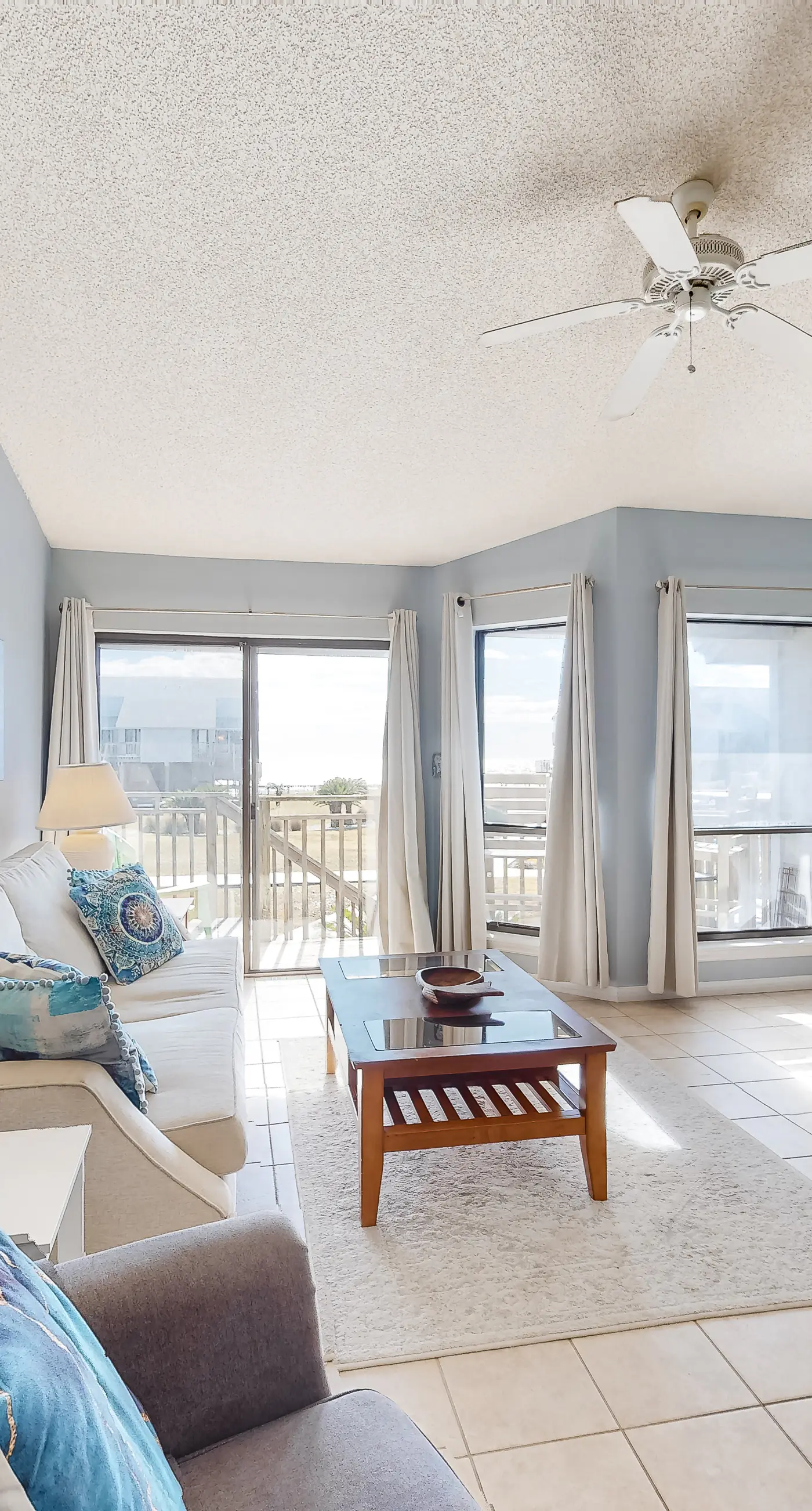 Poolside dog-friendly townhouse with partial Gulf views, on-site pool & grills