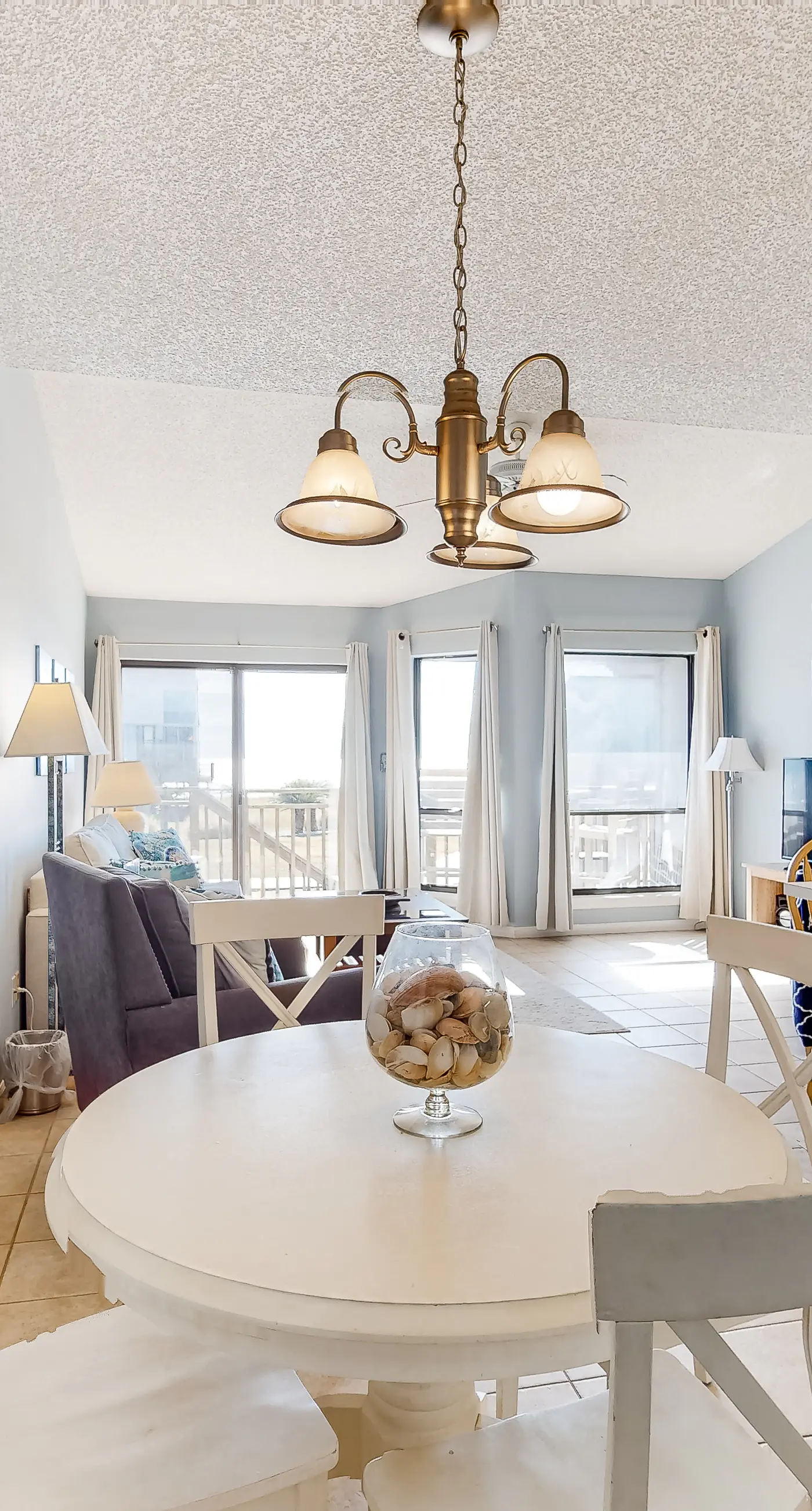 Poolside dog-friendly townhouse with partial Gulf views, on-site pool & grills