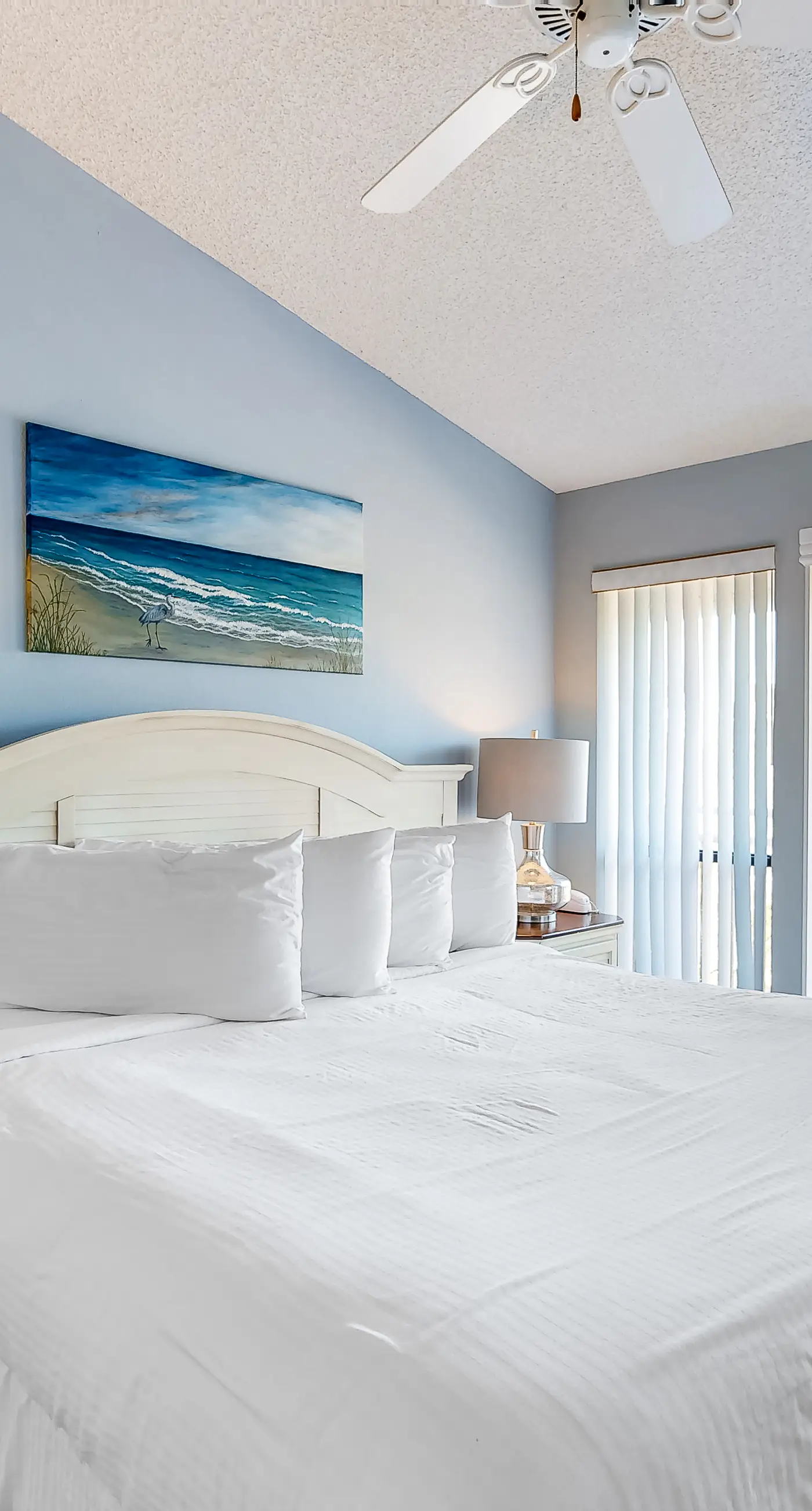 Poolside dog-friendly townhouse with partial Gulf views, on-site pool & grills