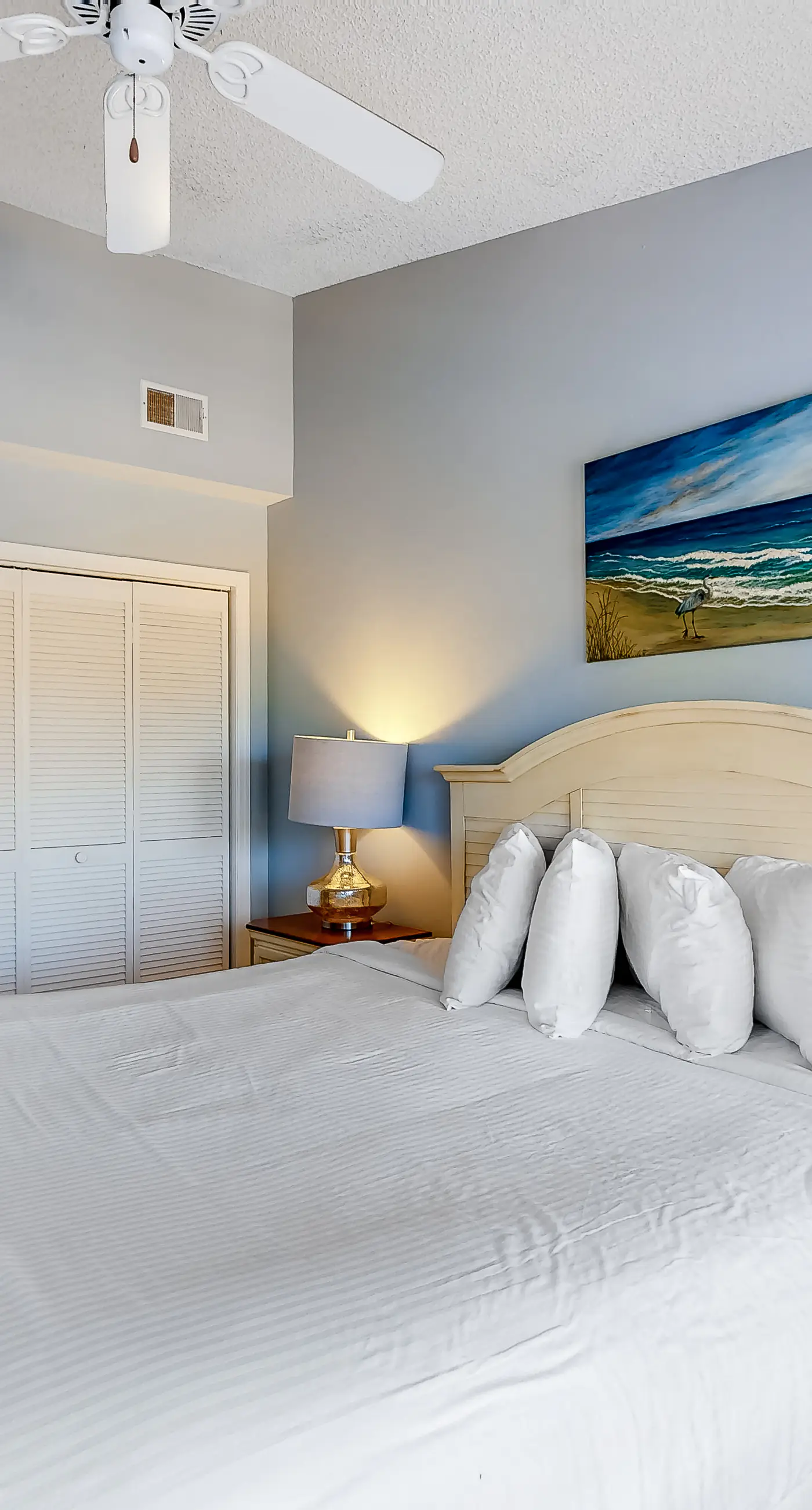 Poolside dog-friendly townhouse with partial Gulf views, on-site pool & grills