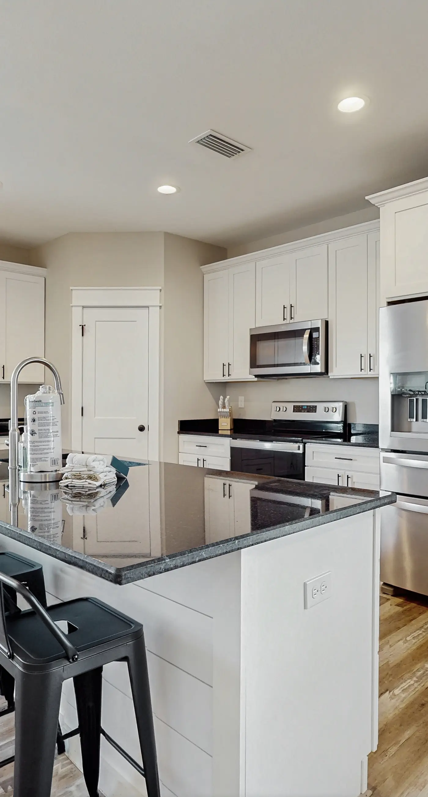 Dog friendly, coastal retreat with fenced yard, private pool, golf cart and cove